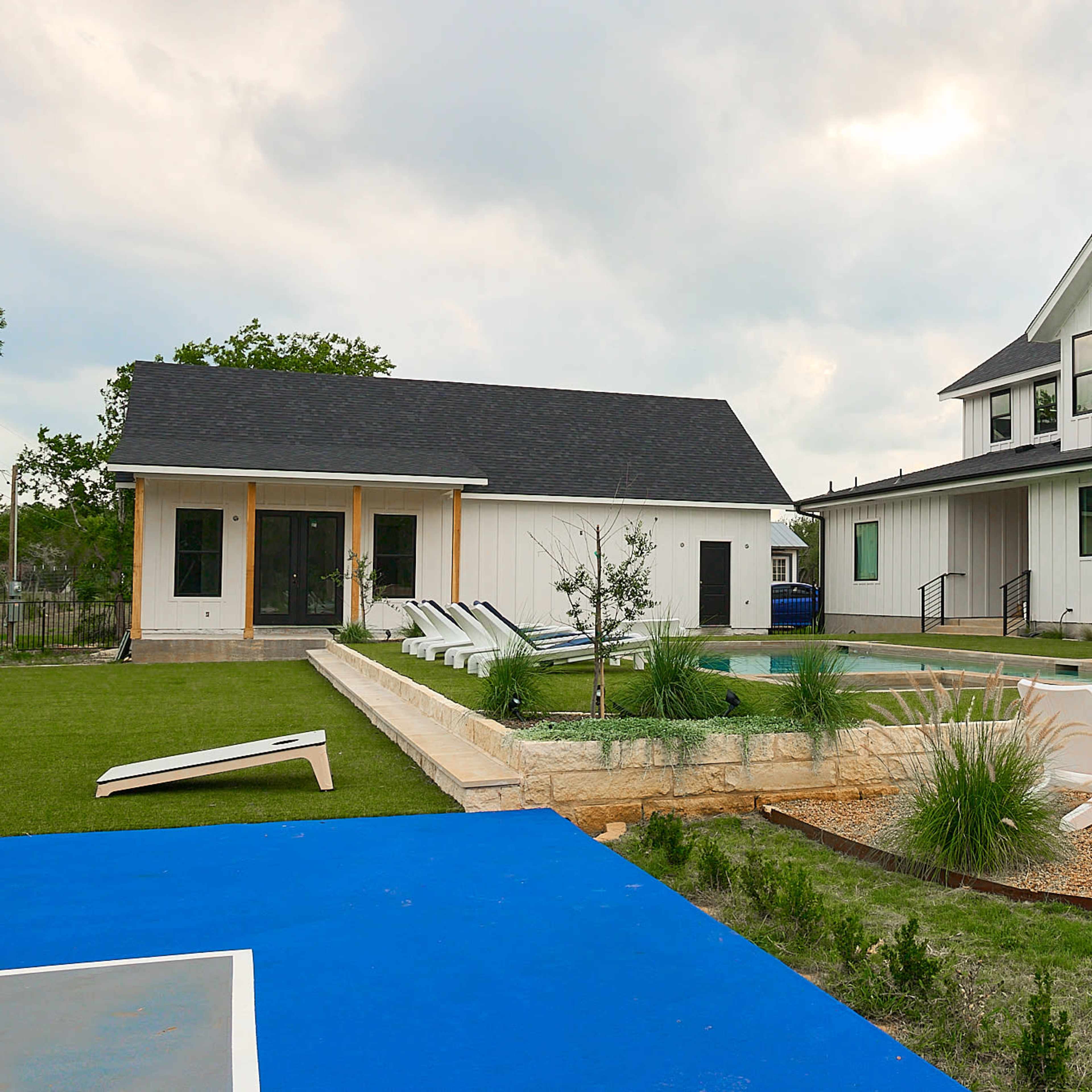 Modern Farmhouse with Natural Light and Turfed Yard Image in Dripping Springs, Dripping Springs, TX