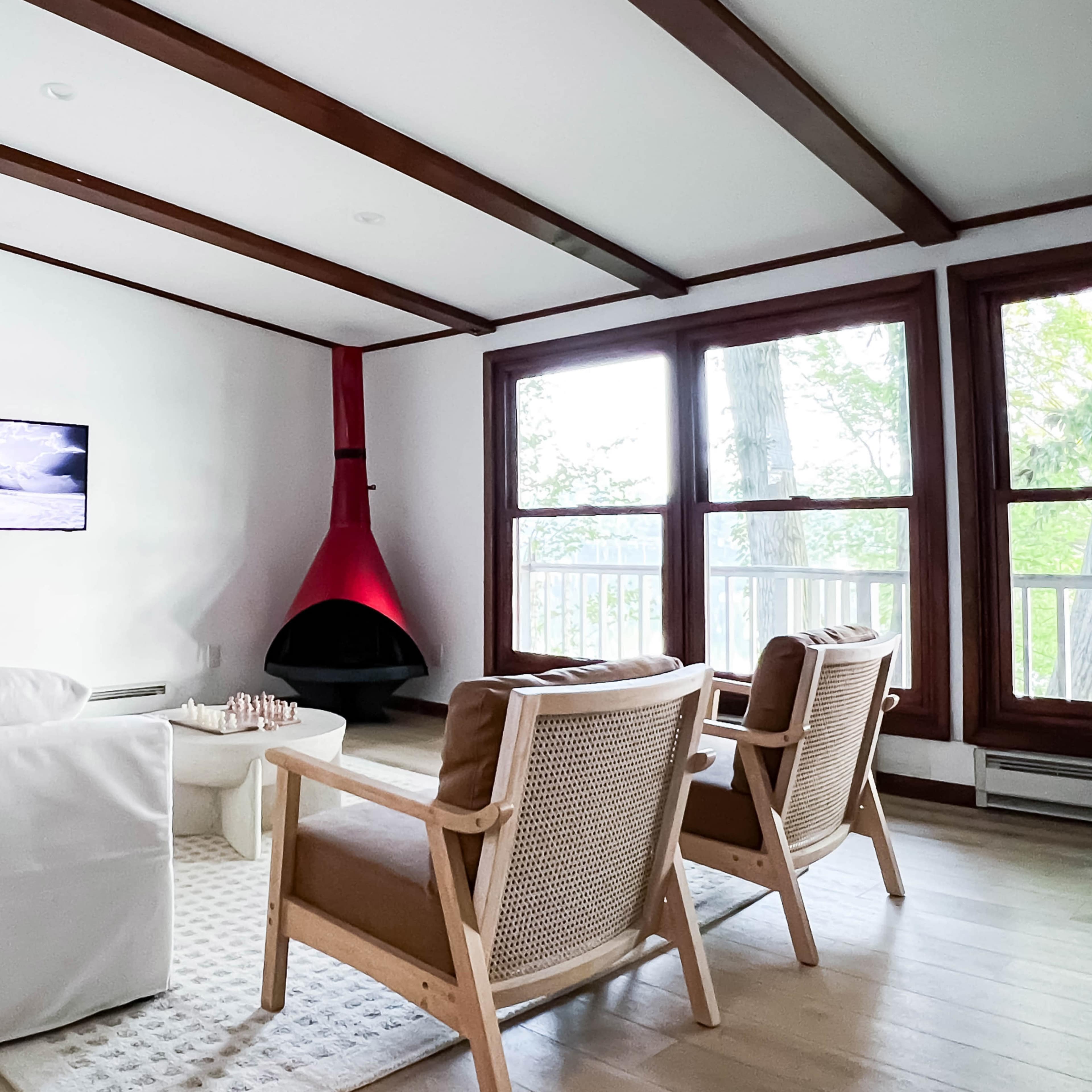 Midcentury Modern lakehouse with a private beach Image in Almena Township, Gobles, MI