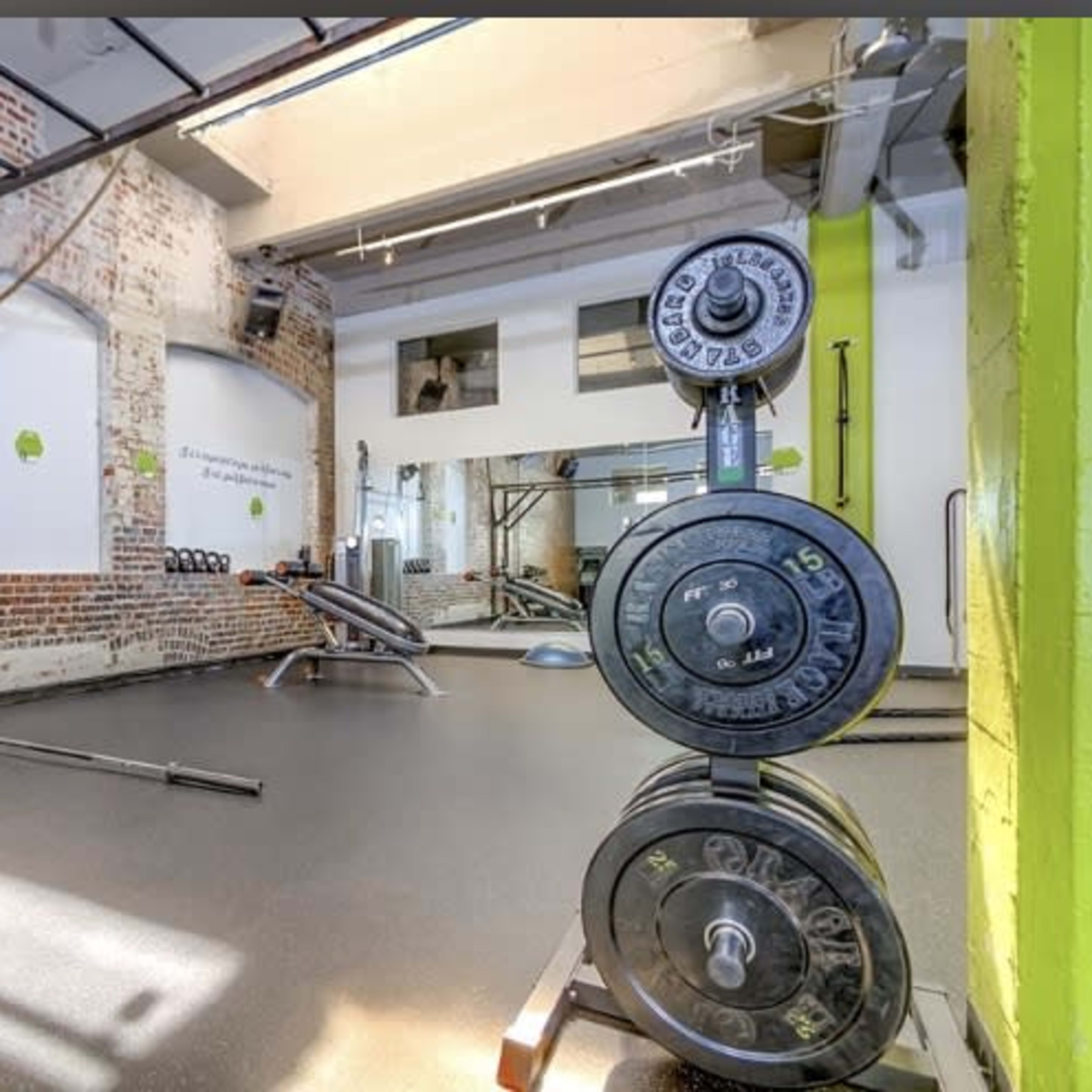 Urban Fitness Studio with Exposed Brick and Natural Lighting Image in Five Points, Denver, CO