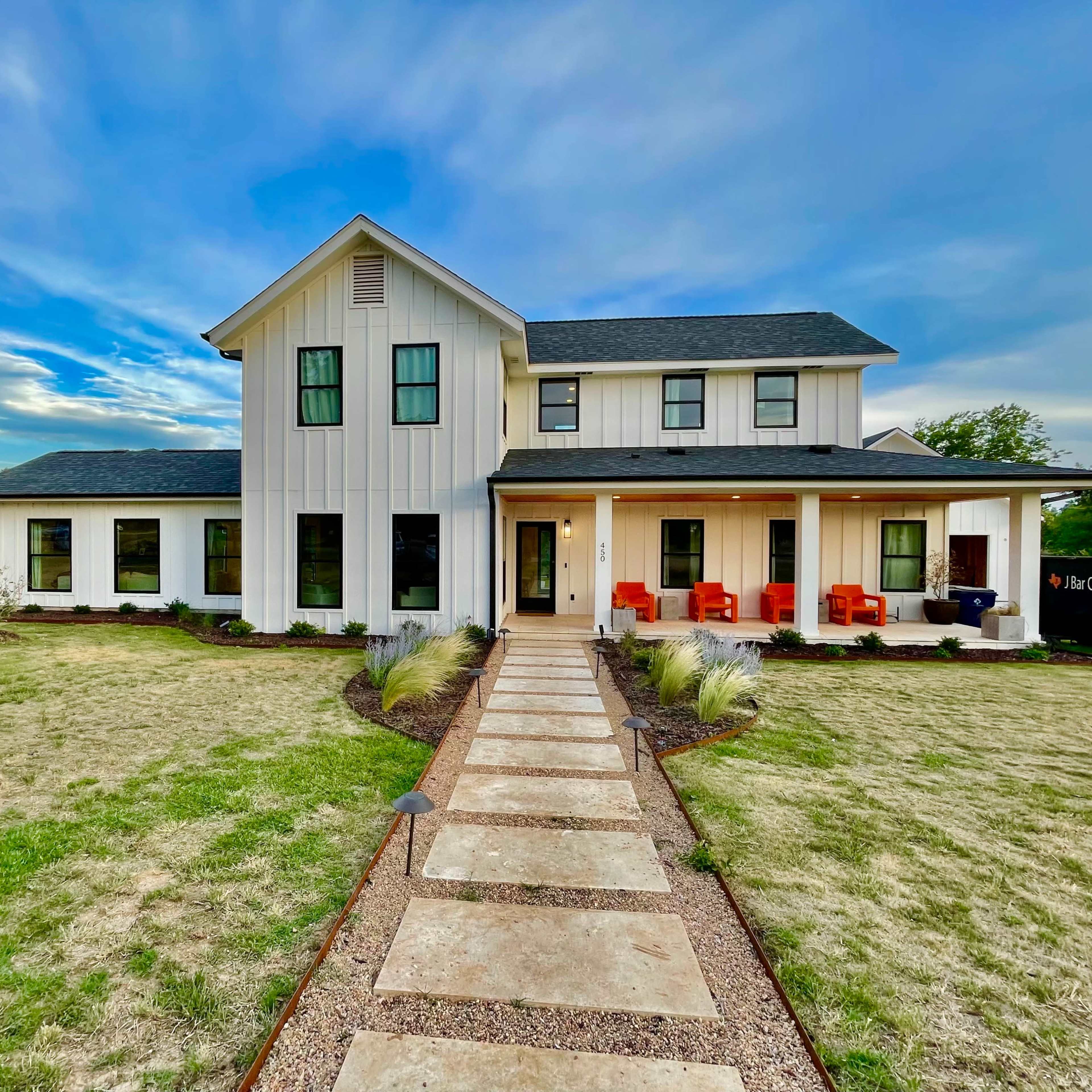 Modern Farmhouse with Natural Light and Turfed Yard Image in Dripping Springs, Dripping Springs, TX
