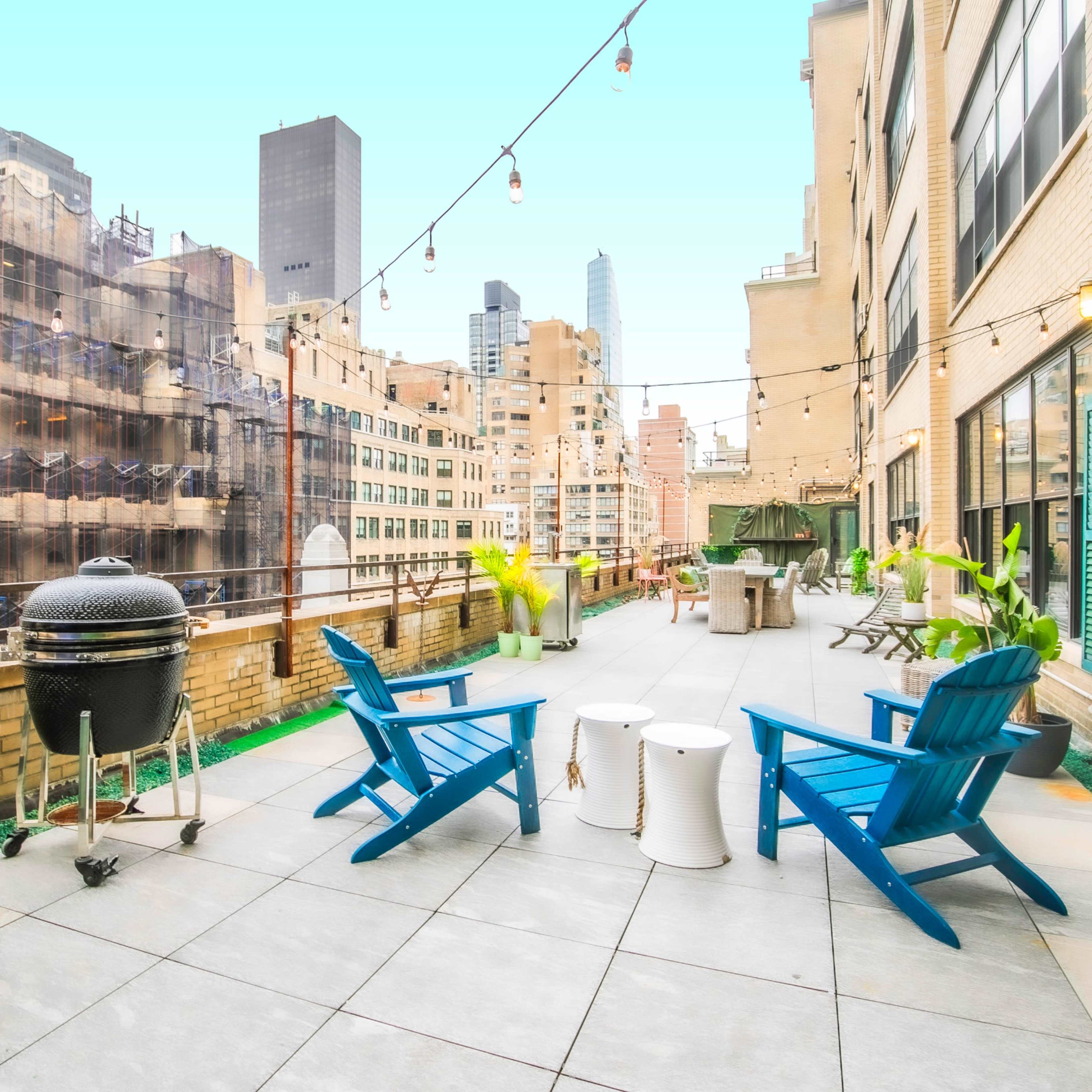 Professional Event Space *Private Outdoor Rooftop + Bar + Indoor lounge with Speak-Easy 'Living Room' Style + Chefs Kitchen Image in Midtown Manhattan, New York, NY