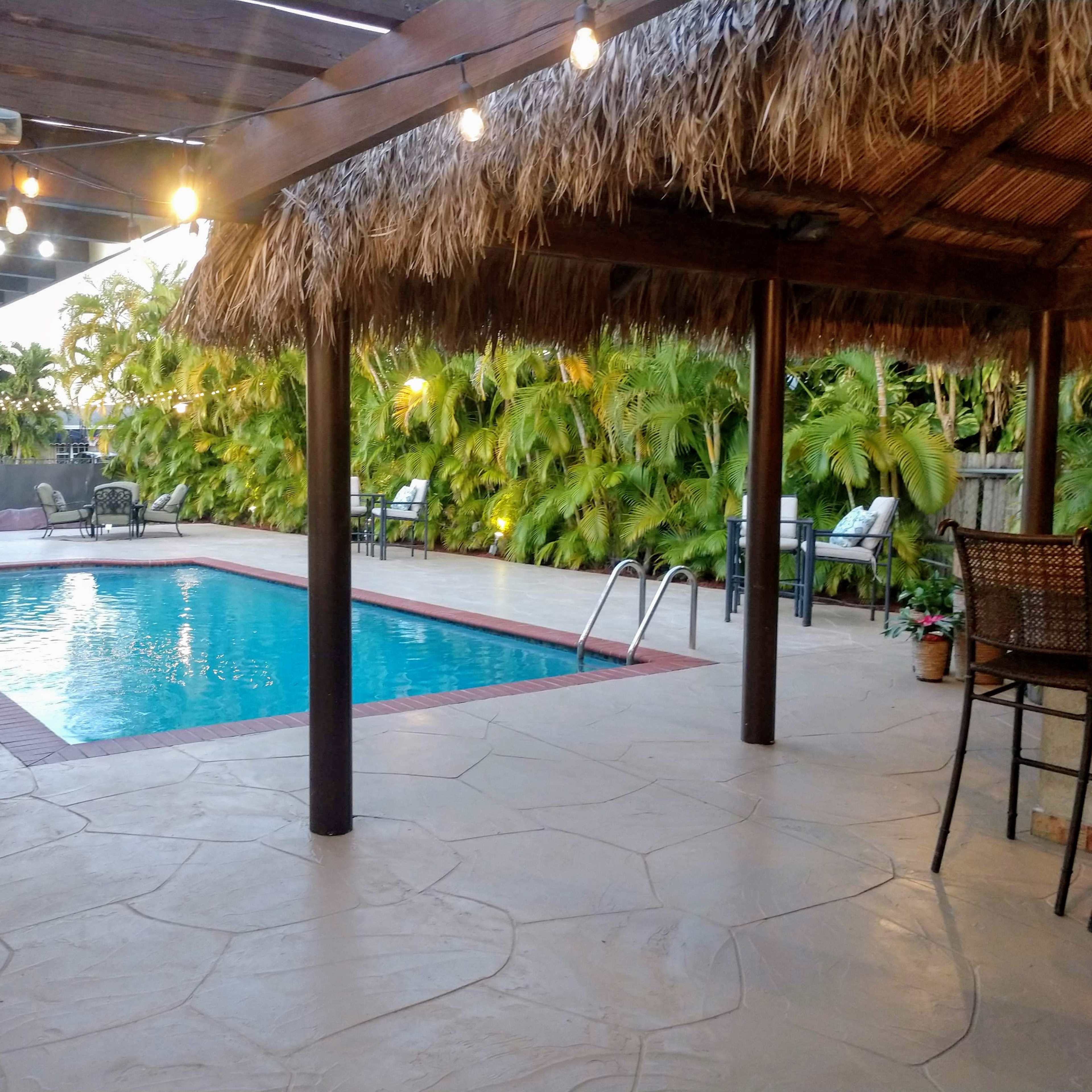 Central Private Tropical Oasis - Pool, Tiki Hut with Swings Image in University Park, Miami, FL