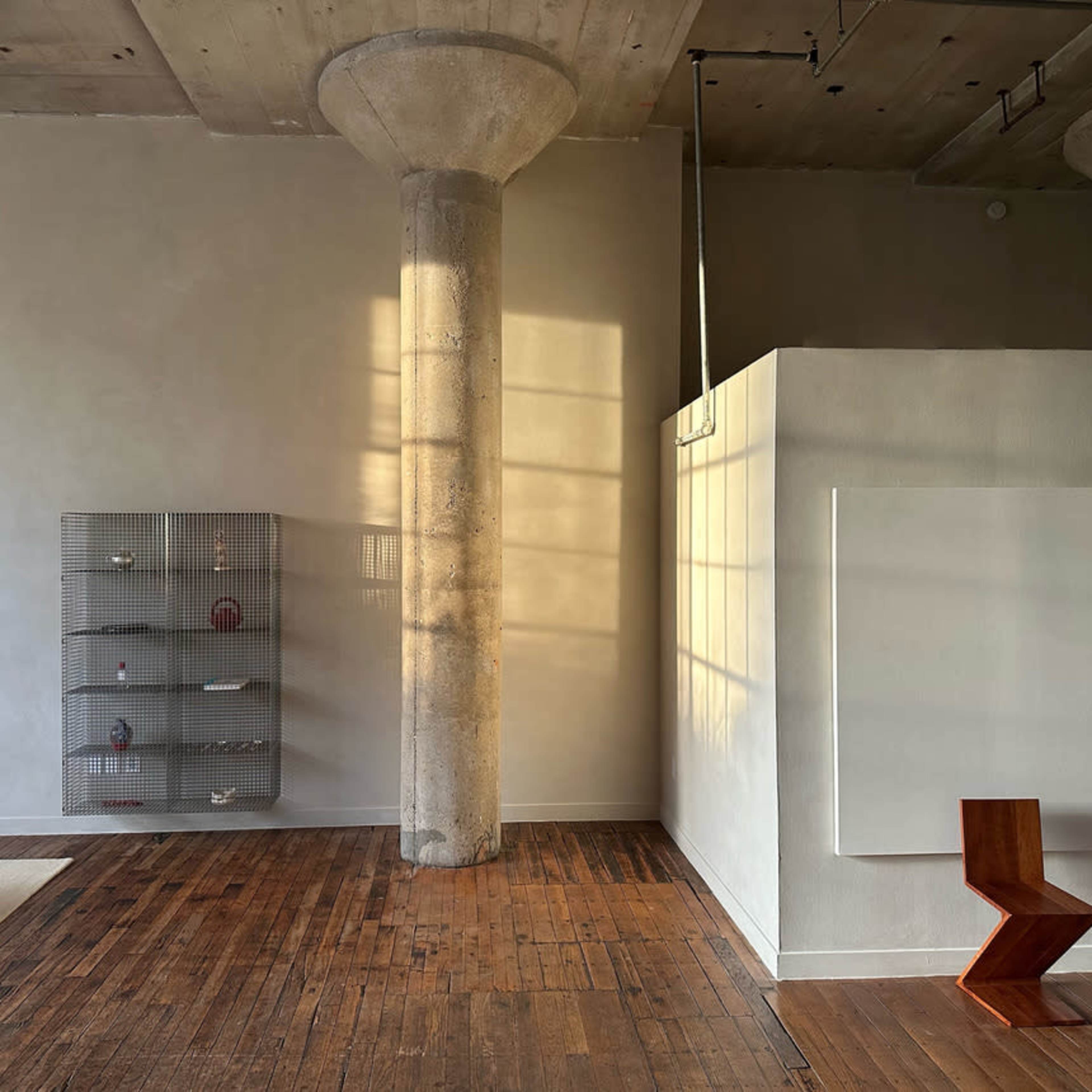 Wabi Sabi Design Loft filled with Light and Skyline View. Image in Deep Ellum, Dallas, TX