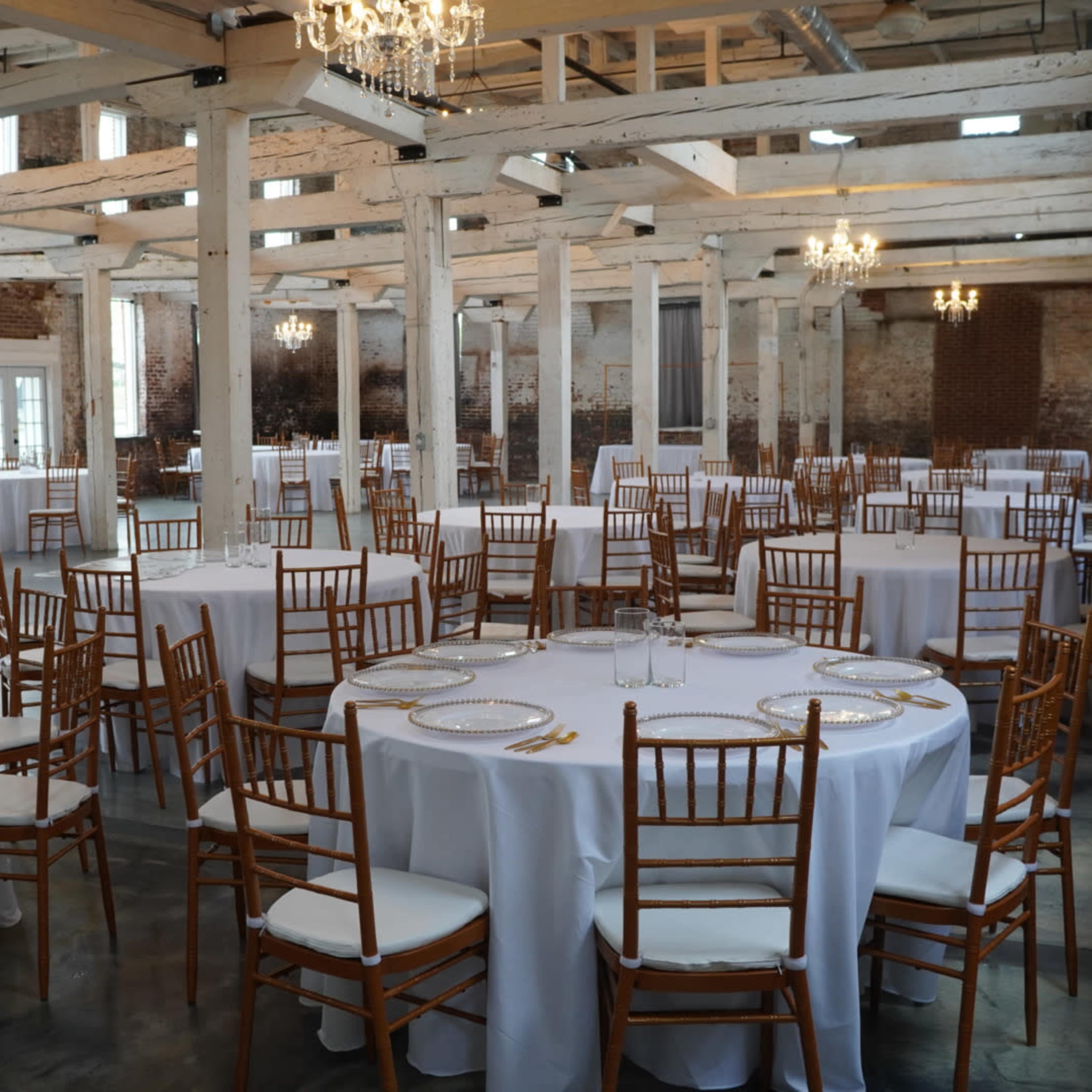 Historic Downtown Space with Exposed Brick and White Beams Image in Buford, Buford, GA
