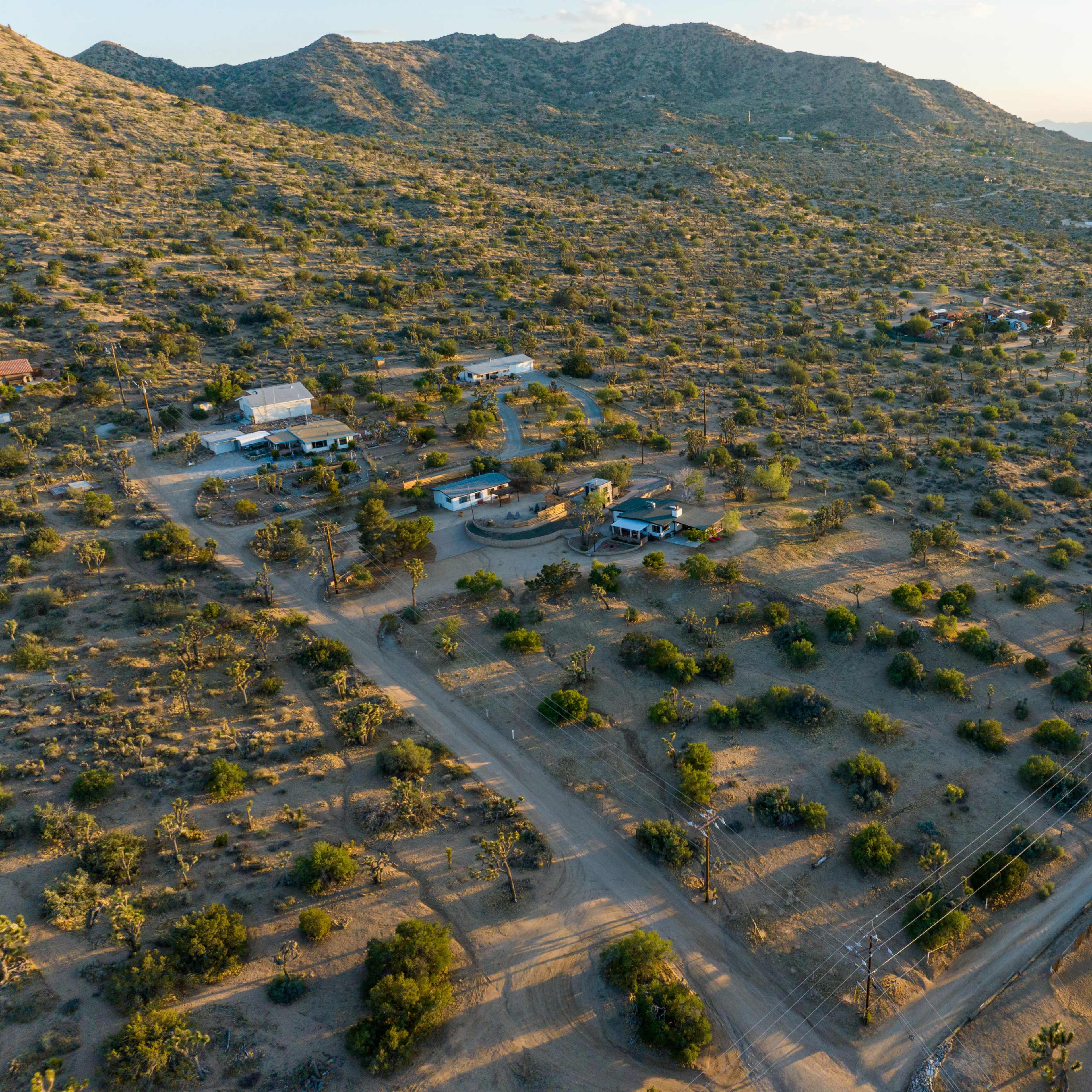 Secluded house, casita and rock tower on 3.5 acres of beautiful hillside desert land with joshua trees Image in Yucca Valley, Yucca Valley, CA