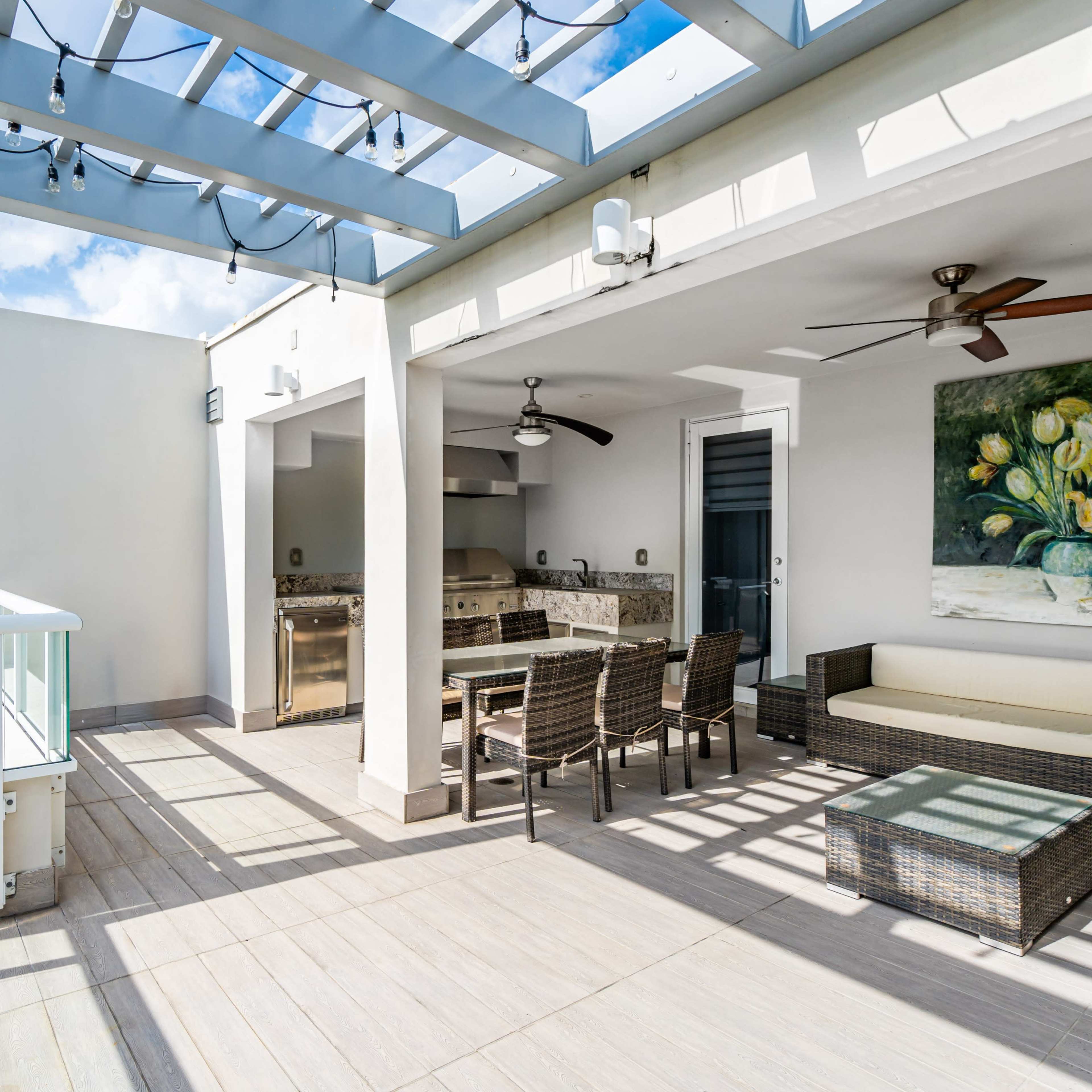 Sky-view Terrace with summer kitchen and mini fridge, four patios in different environments Image in Doral, Doral, FL