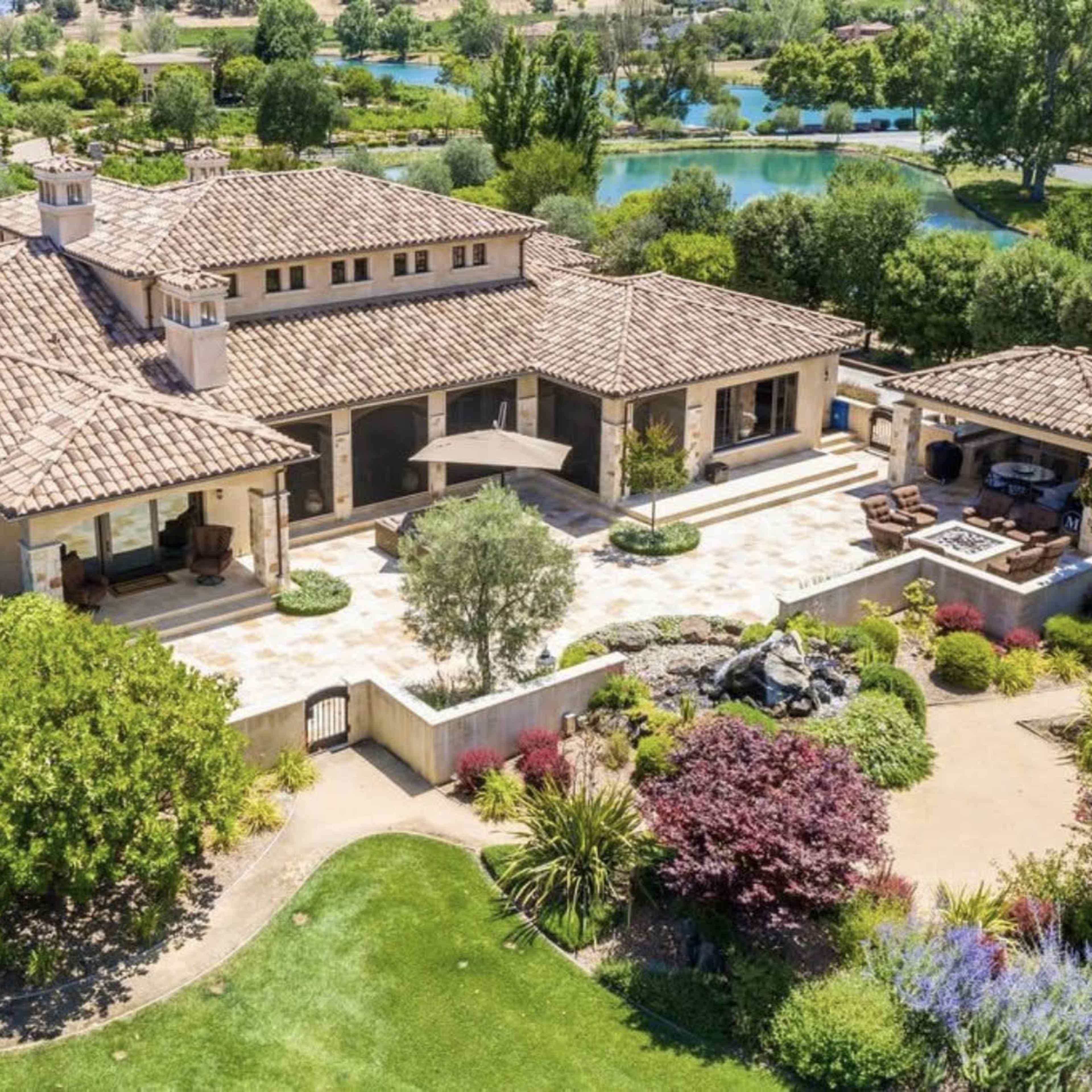 Large Tuscany outdoor with patio overlooking vineyards, mountains and lakes. Image in San Martin, San Martin, CA
