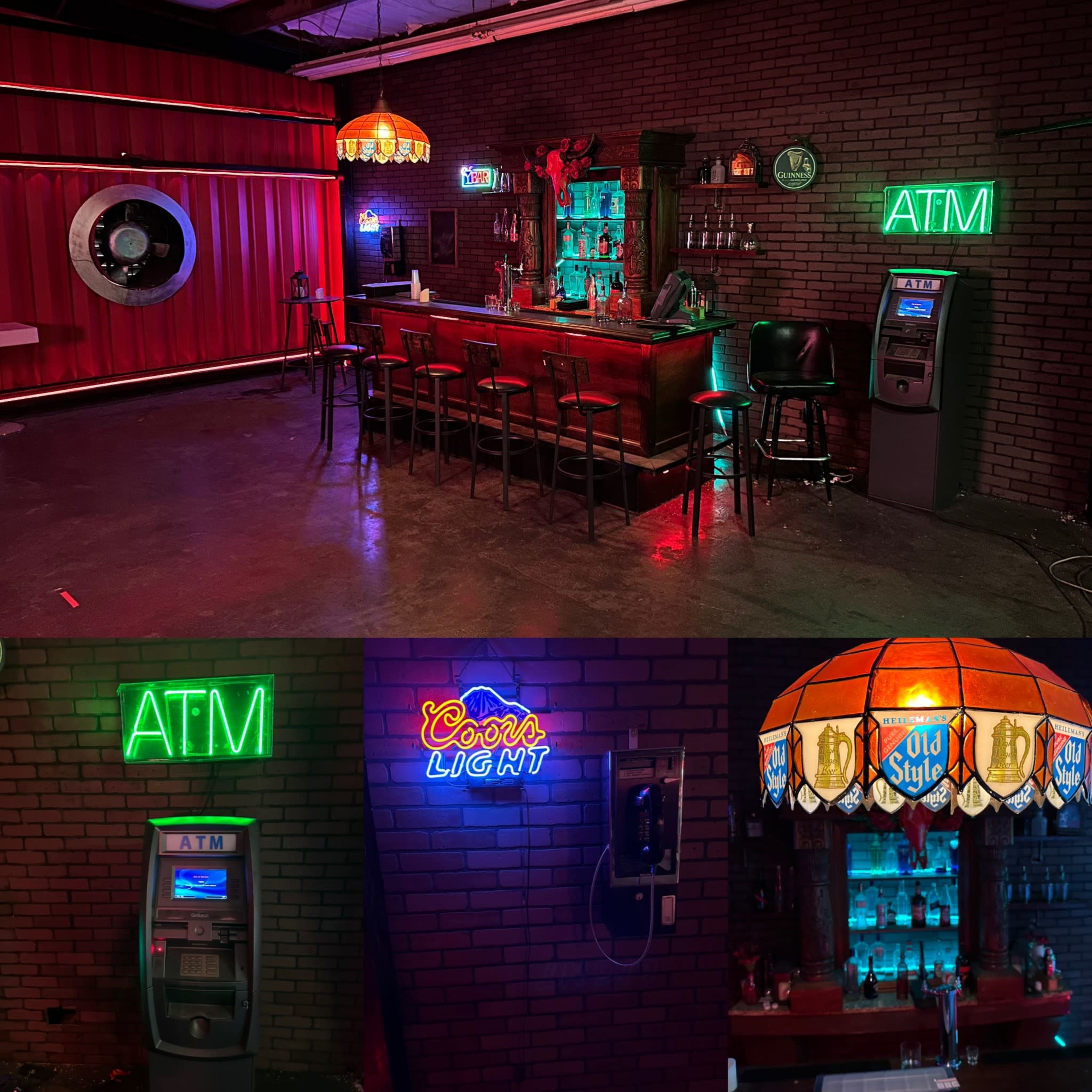 A dimly lit bar area with neon signs, a wooden bar counter with stools, an ATM machine, and various bottles displayed behind the bar.