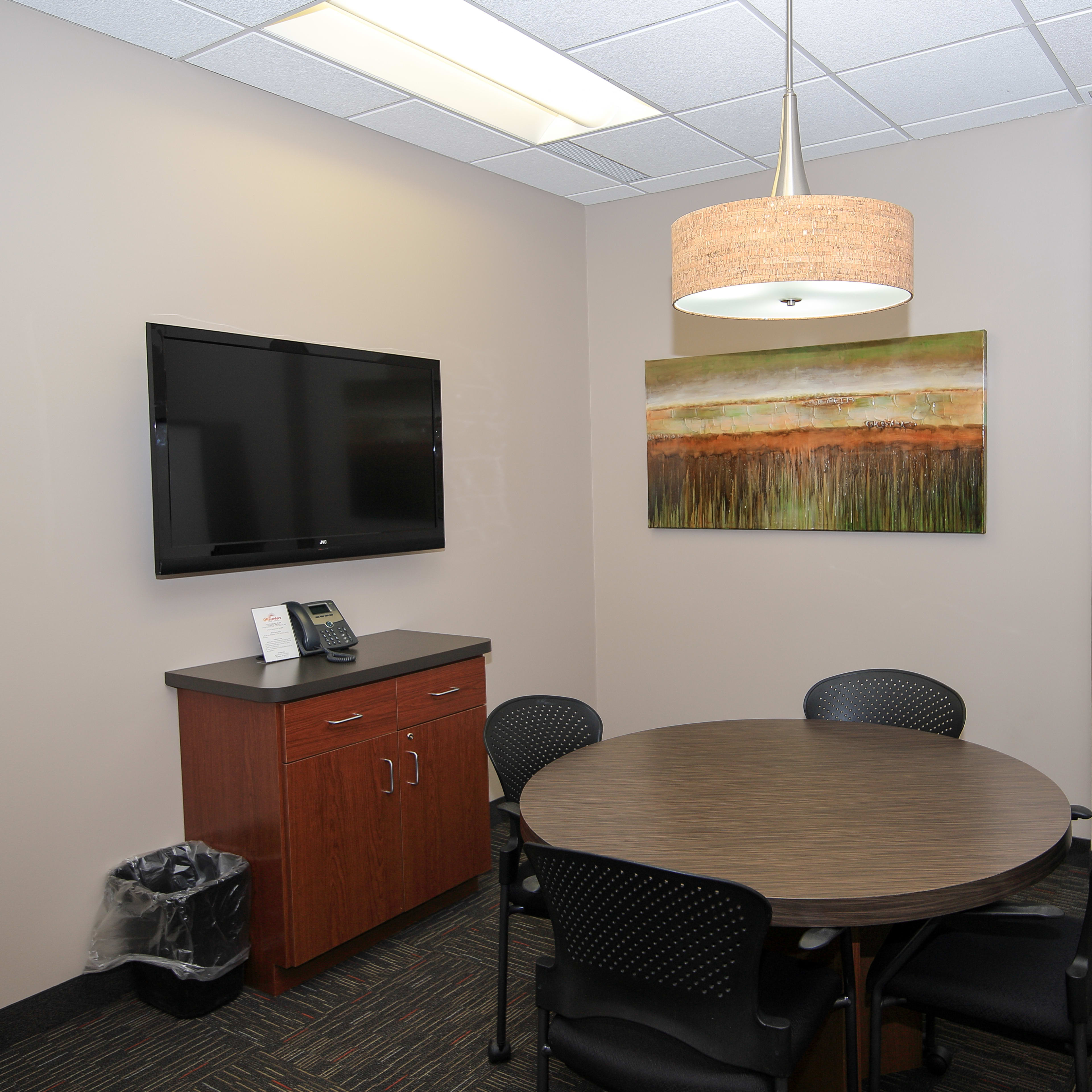 Cozy Collaboration Room - TV - Flip Chart - Conference Phone Image in Blackstone, St. Louis Park, MN