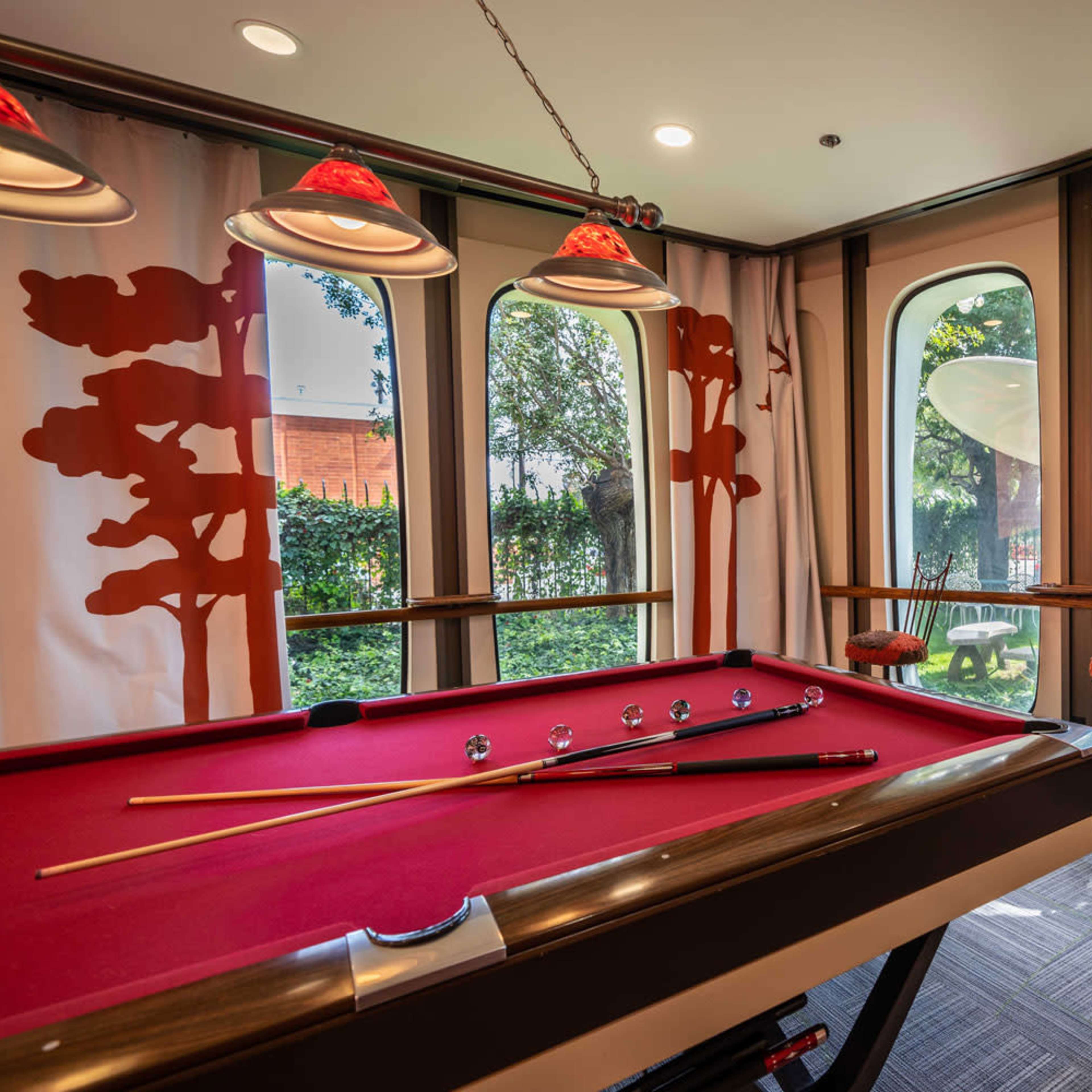 Pool Table In Colorful And Bright Room Surrounded By Mid Century Modern Windows Image in , Compton, CA