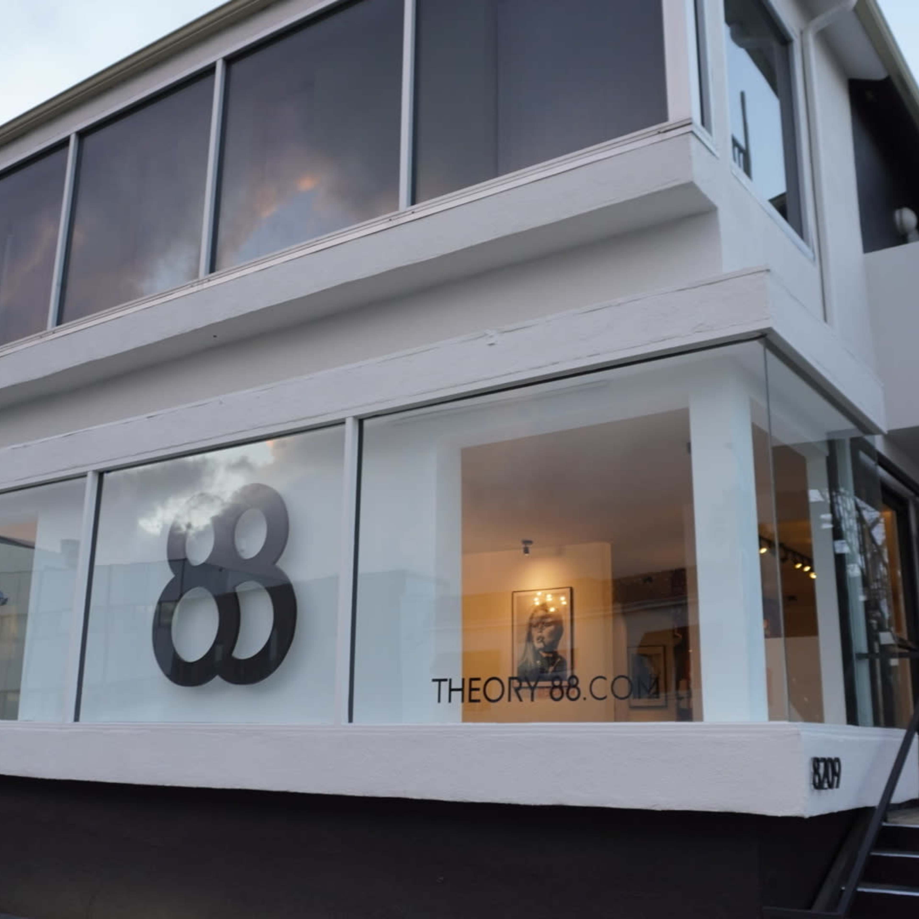 The building features large windows with a prominent "88" logo displayed on the front.