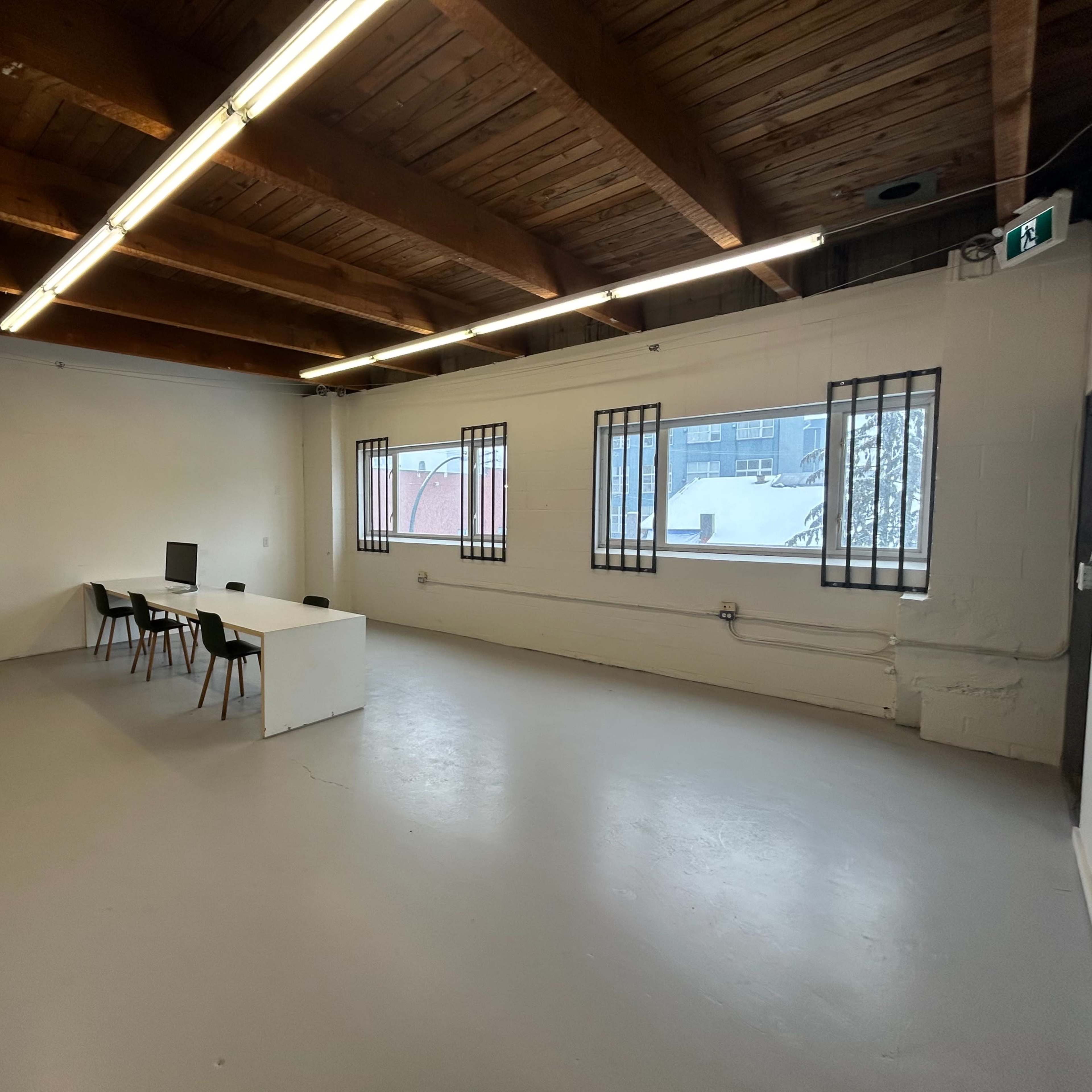 Open concept room with lots of natural light. Image in East Vancouver, Vancouver, BC