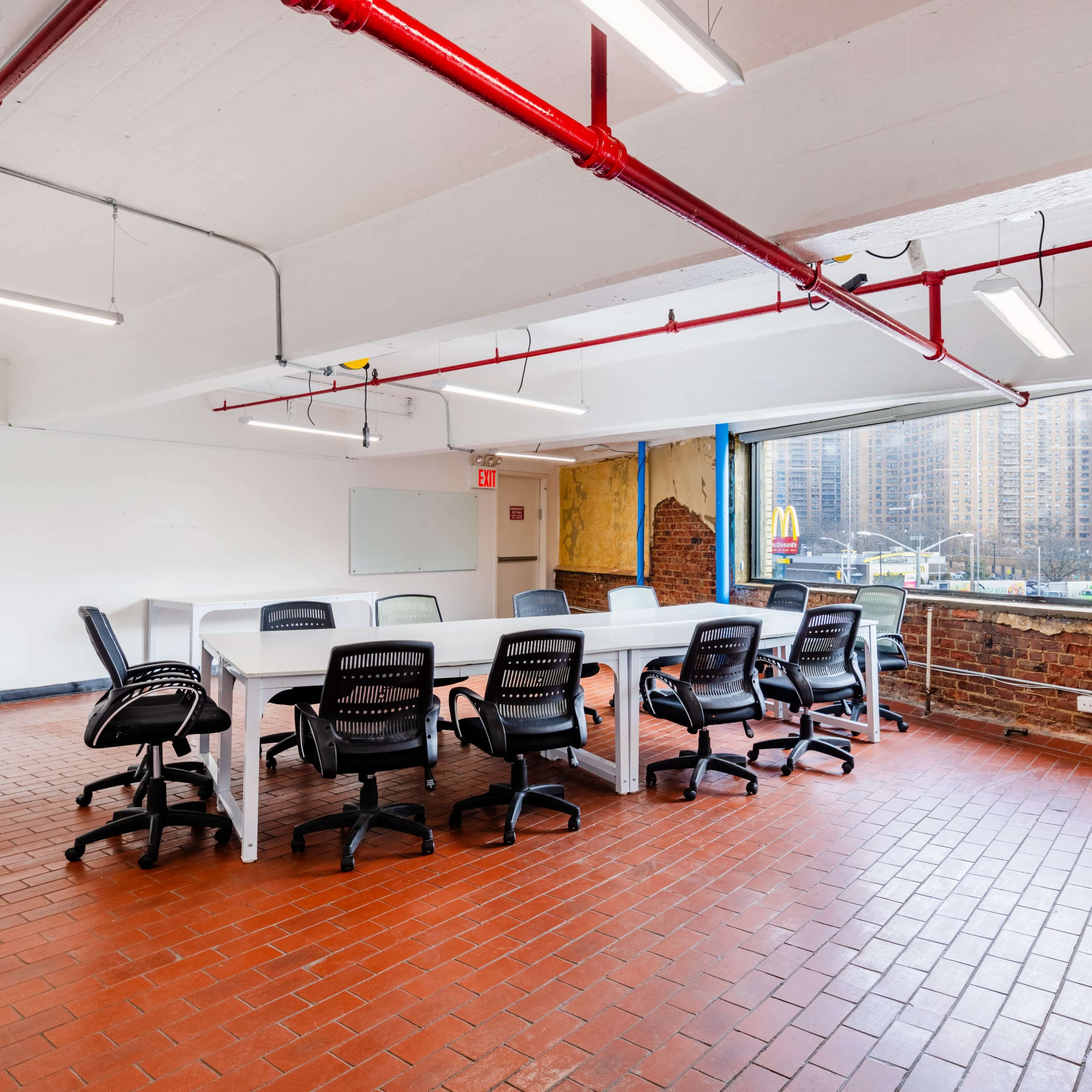BKLYN Commons The Washingtom room,  Open spacious meeting room with natural sunlight and a rustic feel. Image in Little Caribbean, Brooklyn, NY