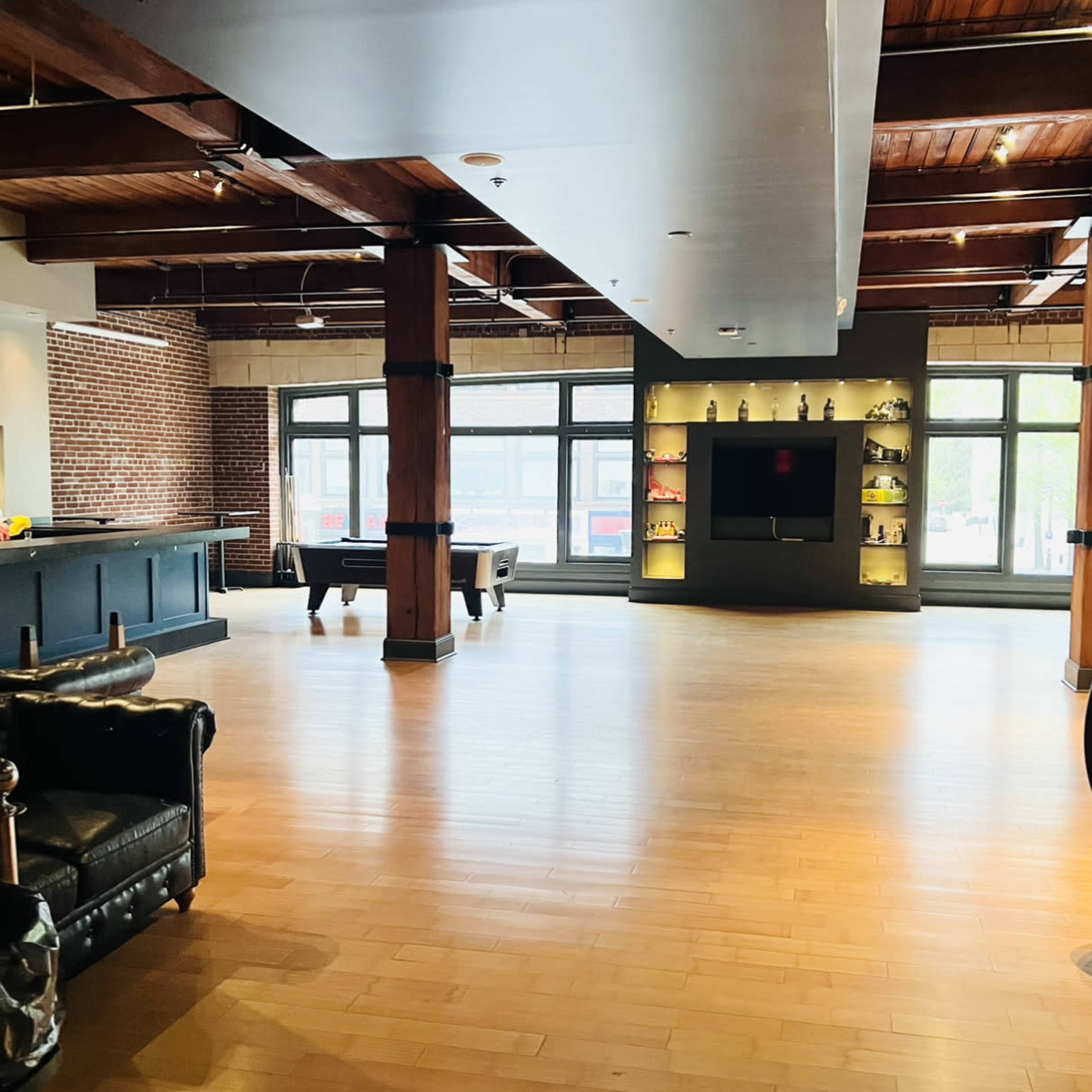Downtown Event Space with bar and Large windows with view of Washington Ave Image in Downtown West, St. Louis, MO