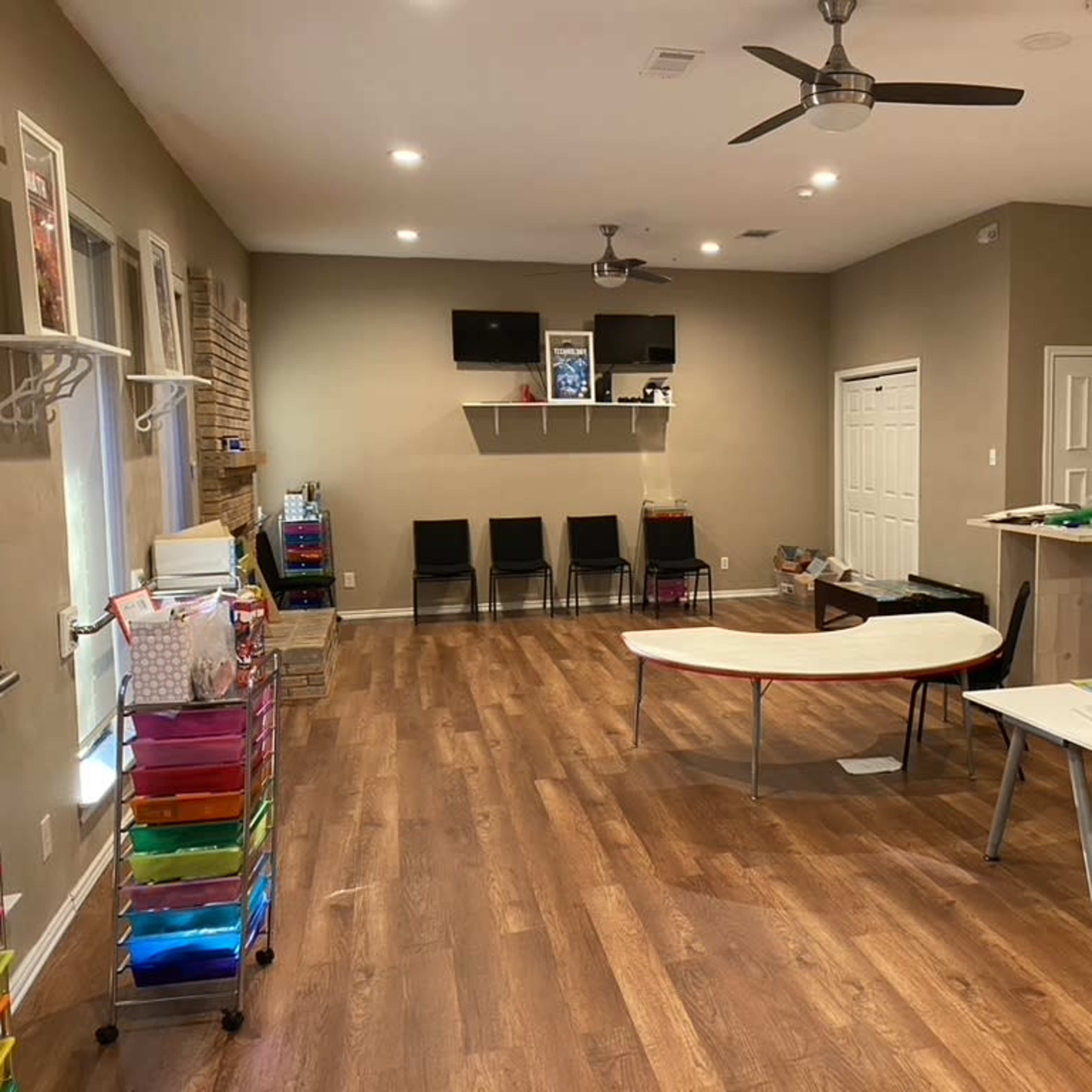 Large, roomy area with bathroom, sink and windows Image in Garland, Garland, TX