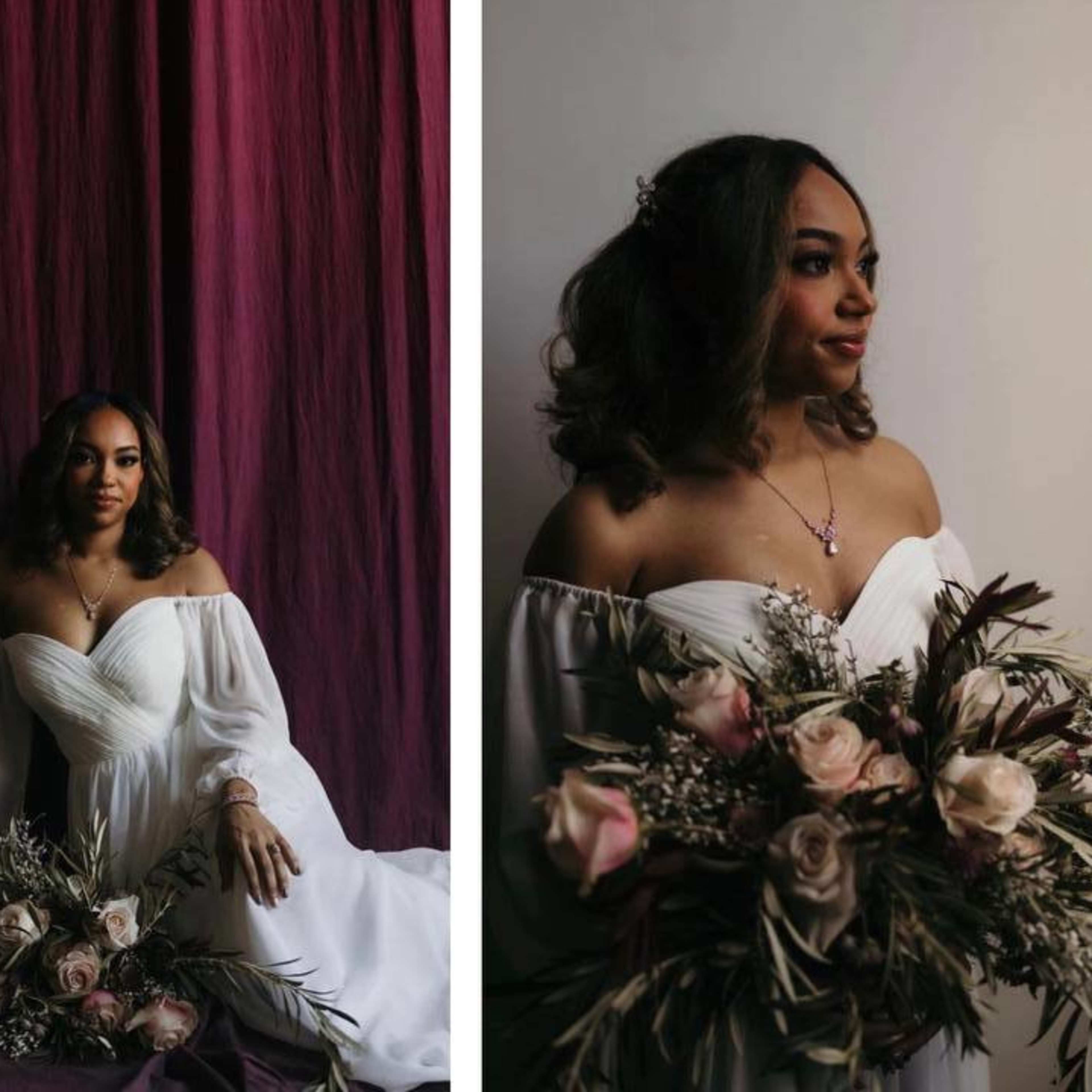 A woman in a white off-the-shoulder wedding dress sits elegantly on a green couch, holding a bouquet of flowers in a dimly lit room with a purple backdrop.
