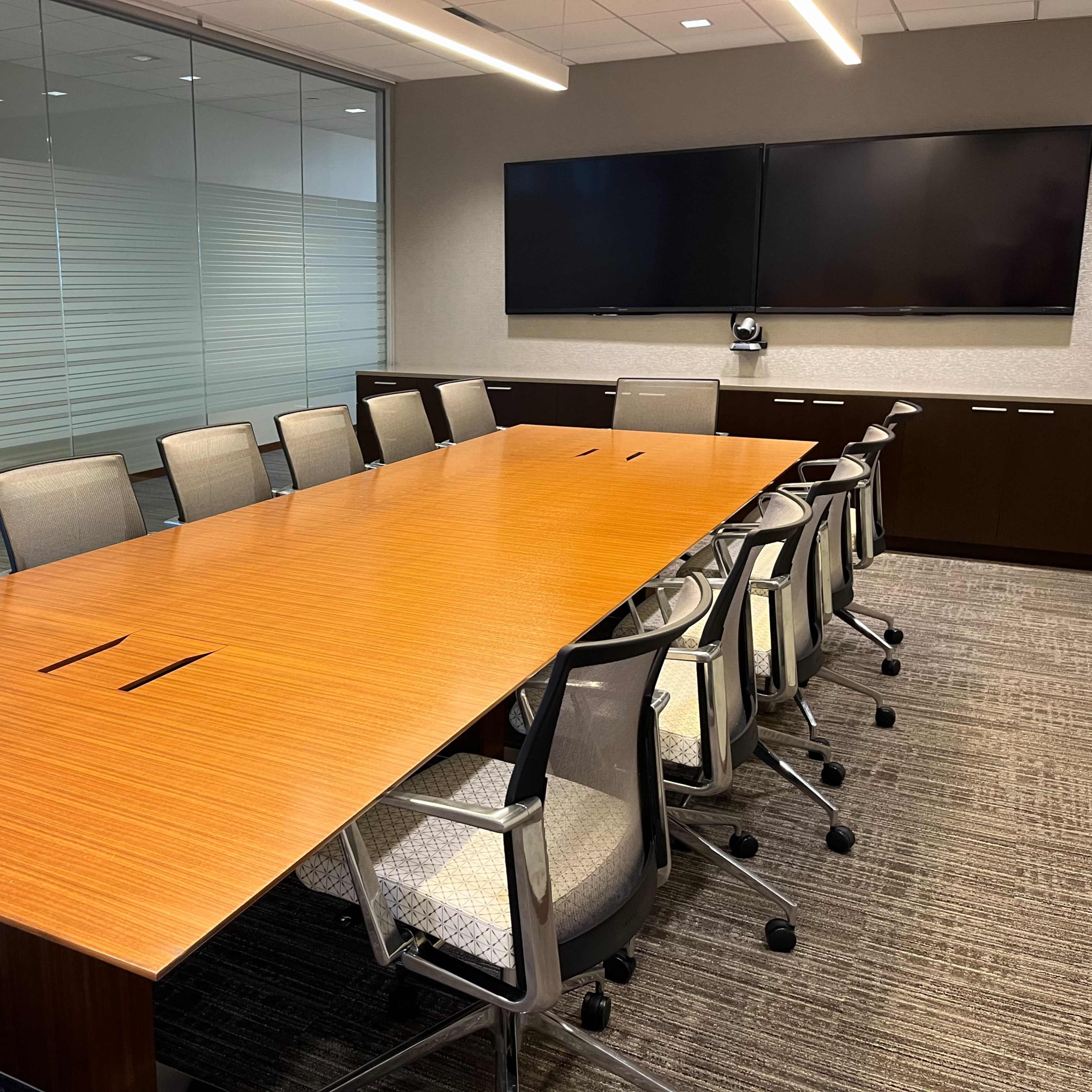 Modern 12-Person Meeting Room in Top Floor Coworking Space Image in Schaumburg Township, Schaumburg, IL
