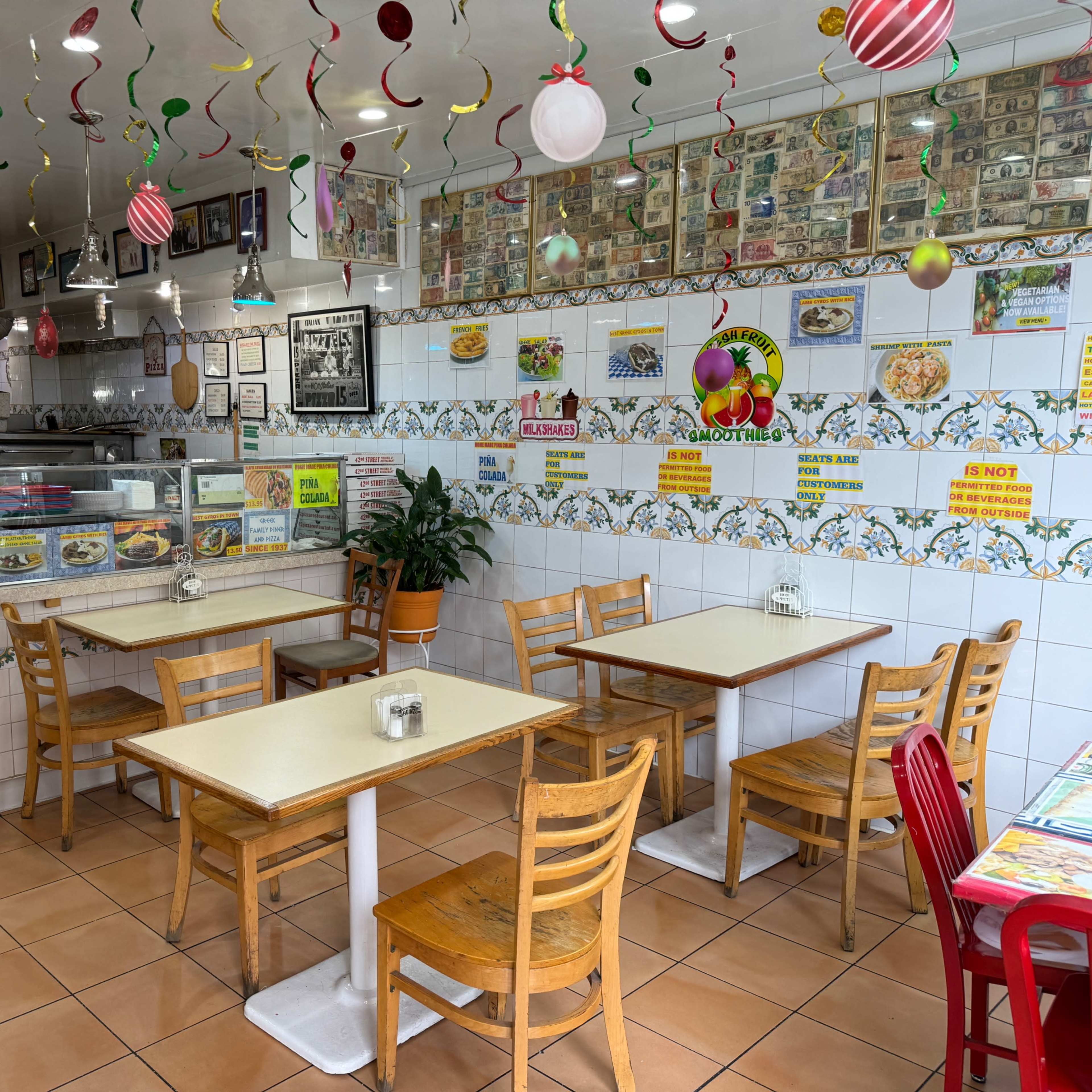 Cozy Family Restaurant with an old-school setting Image in Midtown Manhattan, New York, NY
