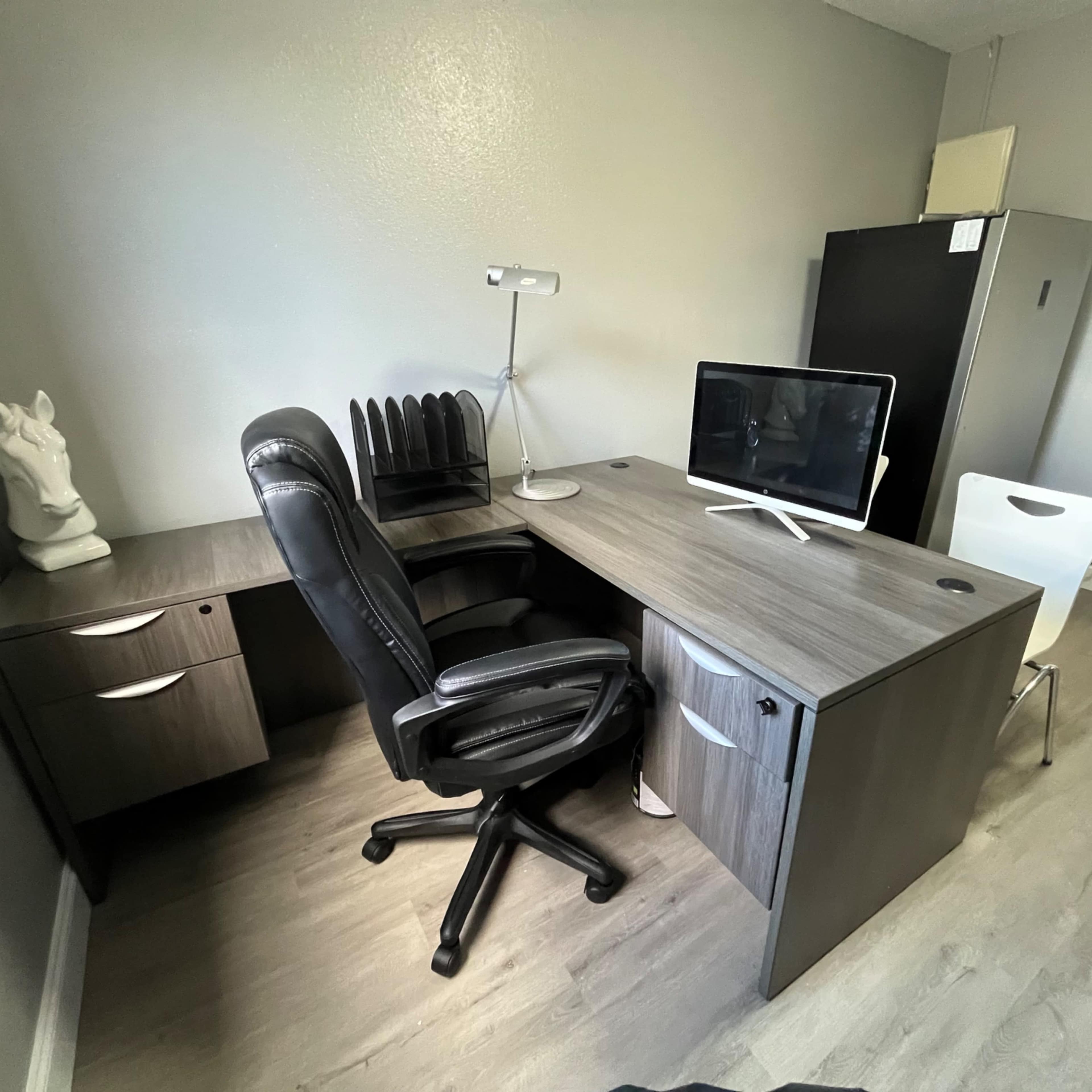 Modern office space with refrigerator/freezer Printer and couch Image in Temple Terrace, Temple Terrace, FL