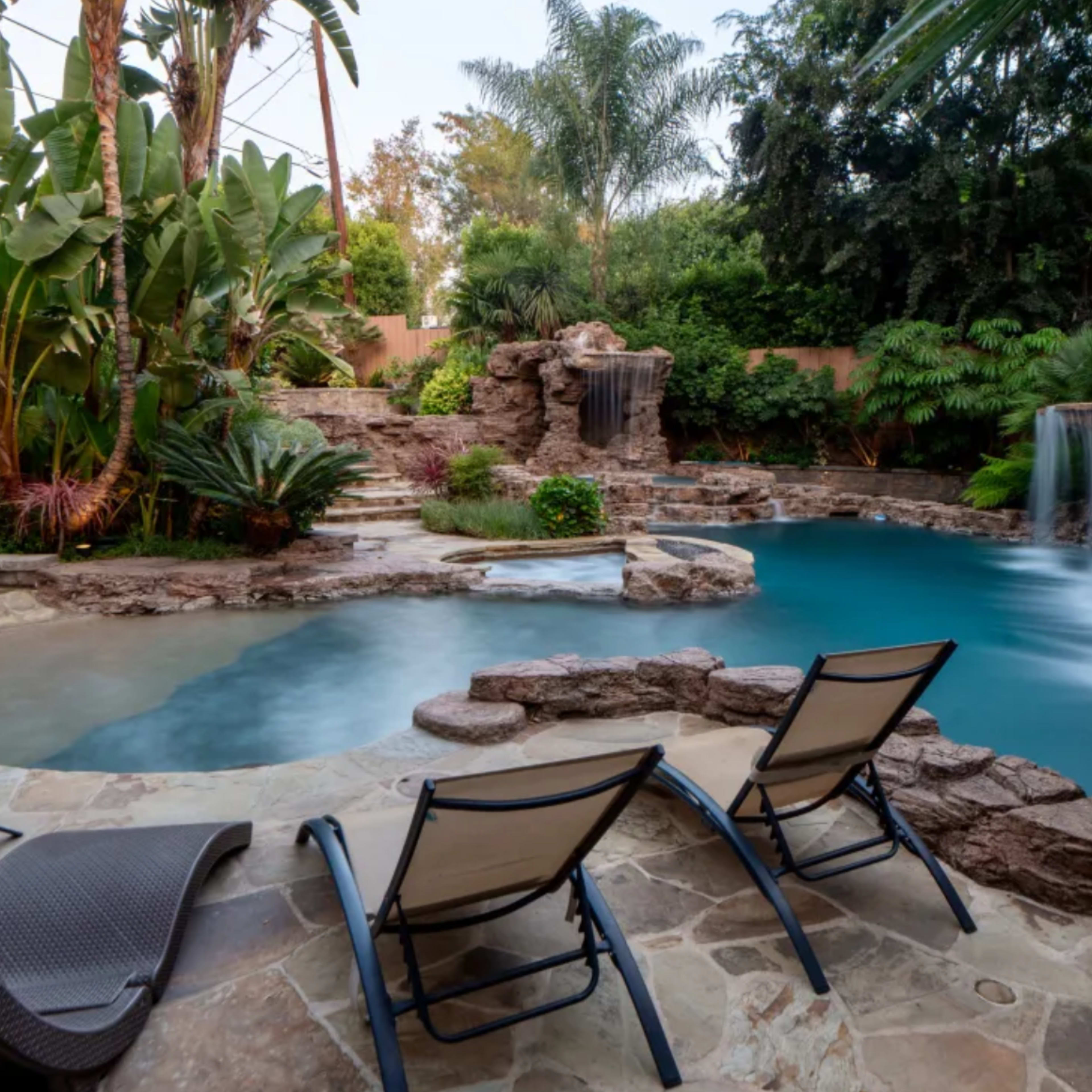 Beautiful Vegas type pool with waterfall and hot tub. Image in Valley Village, Los Angeles, CA