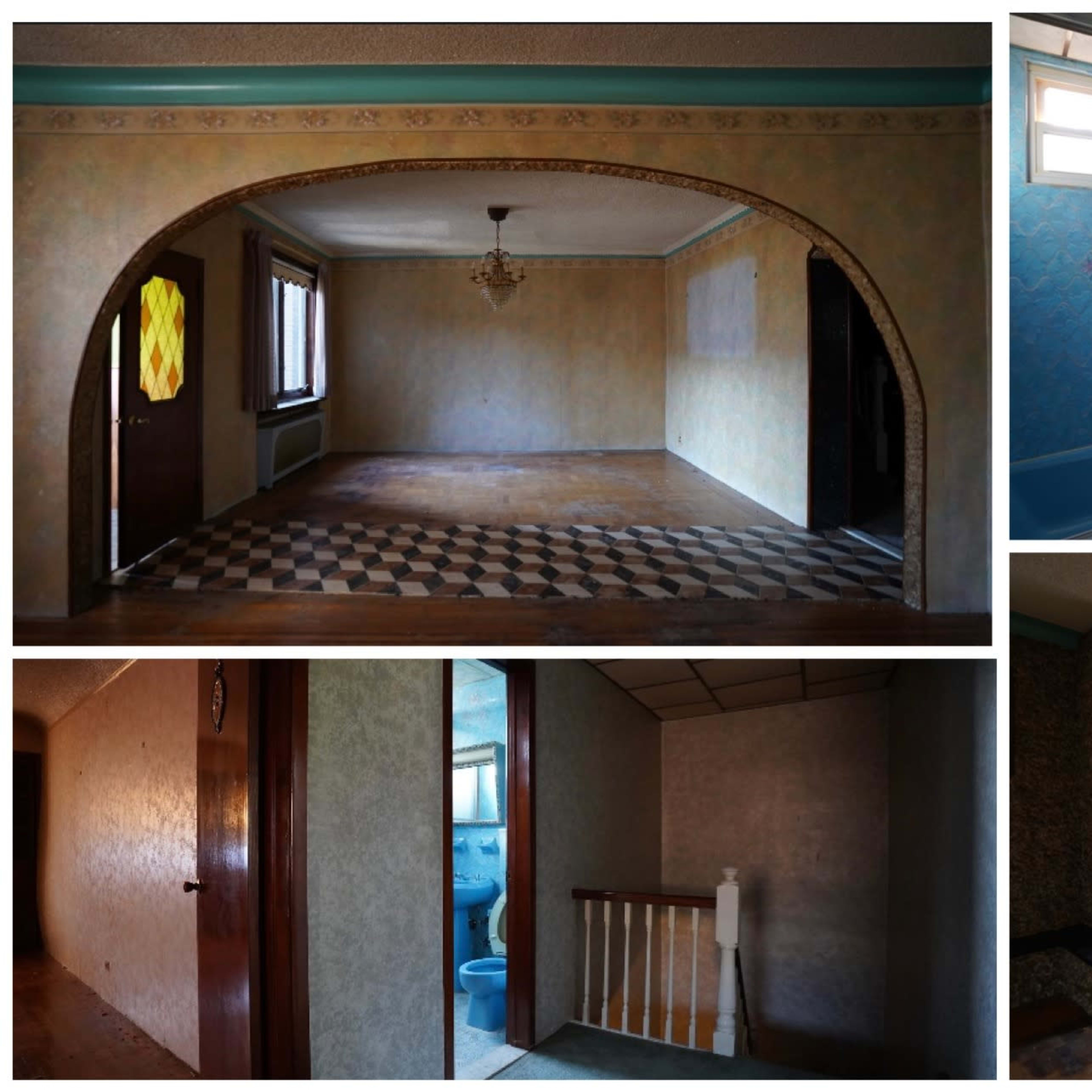 An empty house interior featuring a living room with patterned flooring, a bathroom with blue walls, a hallway, and a stone fireplace.