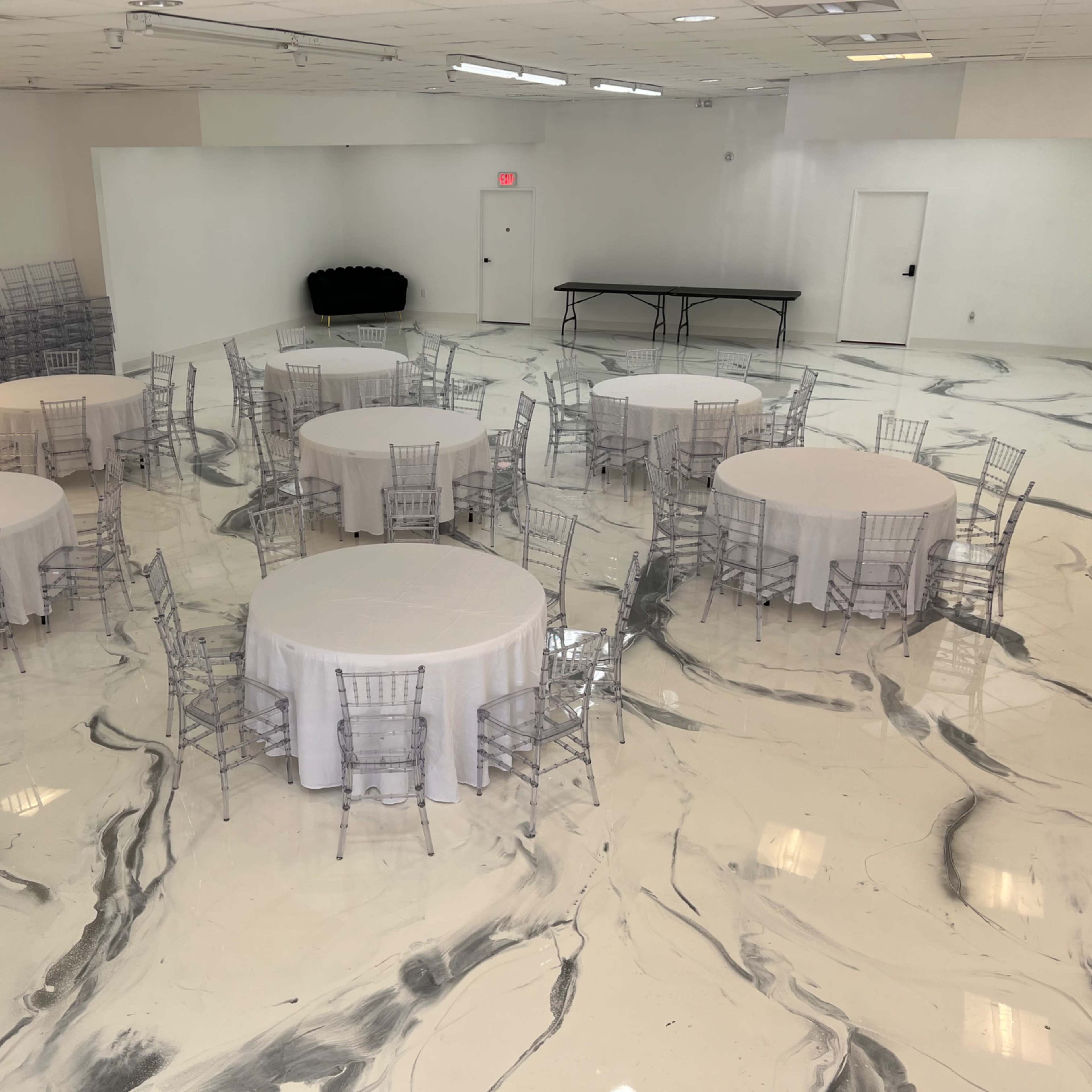 Contemporary event venue with a stunning all white aesthetic. Image in Town N Country Alliance, Town 'n' Country, FL