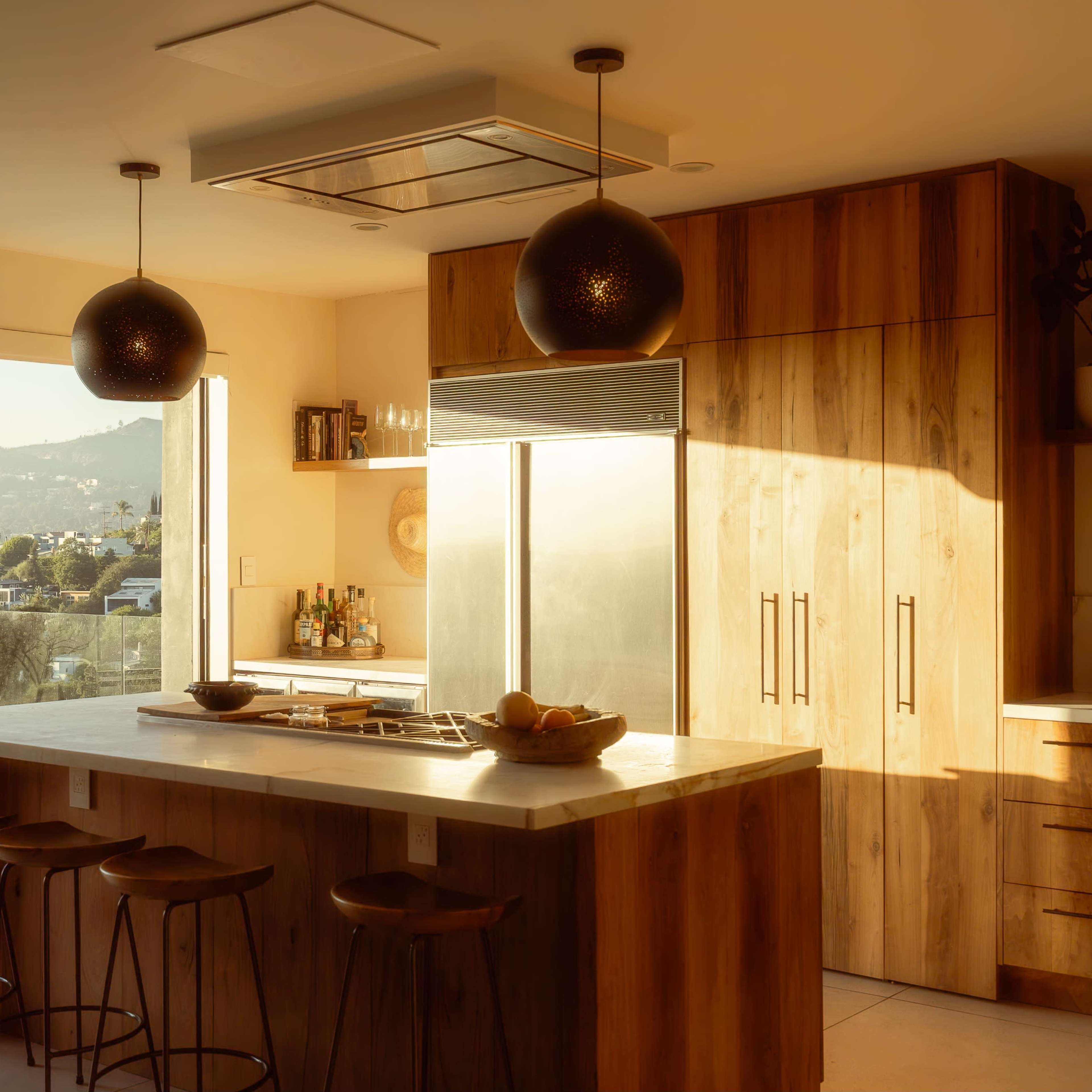 Hip view home. 30’ of bookshelves and open chef’s kitchen w/ stove in island Image in Silver Lake, Los Angeles, CA