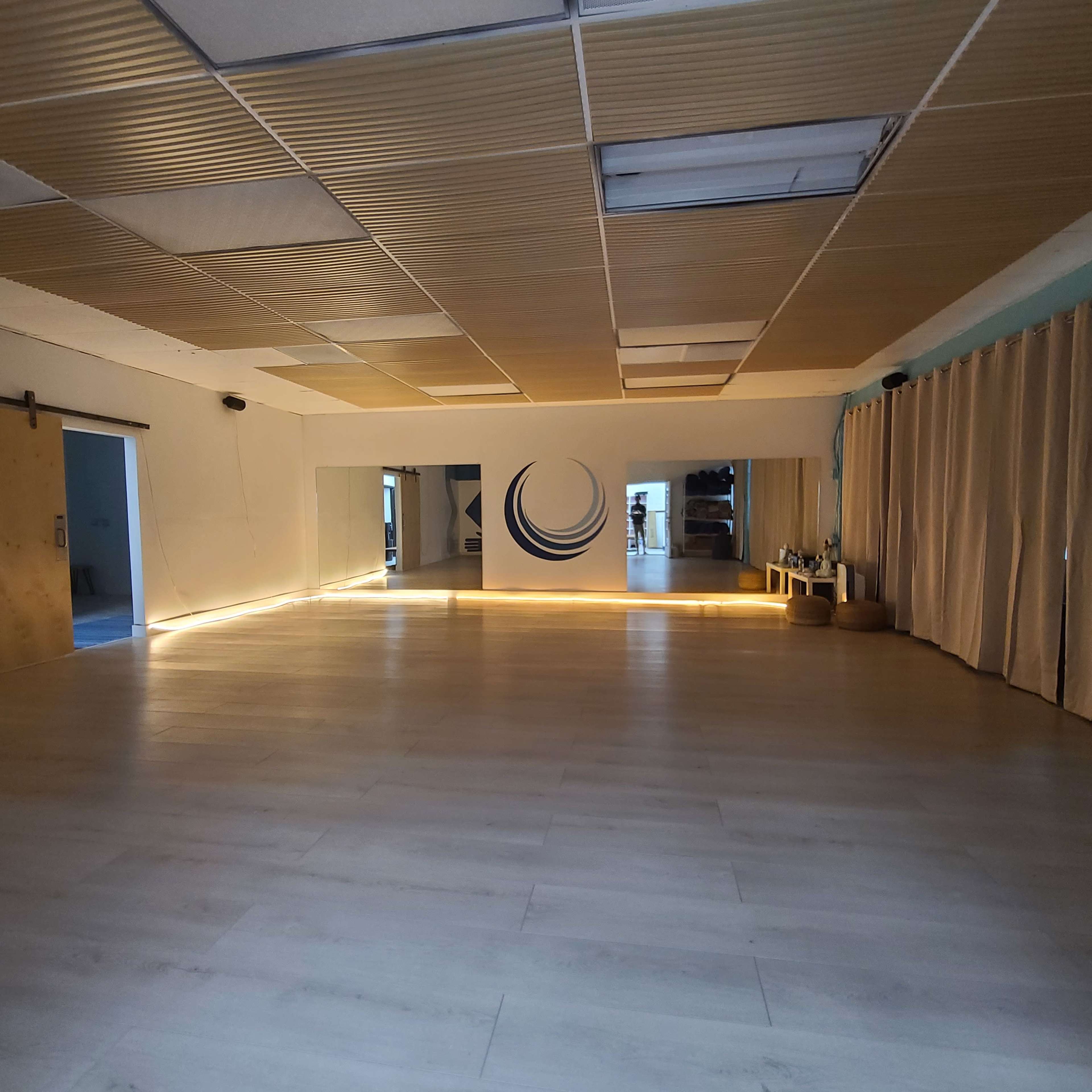 Beach Town Yoga Studio with giant parking lot and direct access to freeway. Image in Pacific Beach, San Diego, CA
