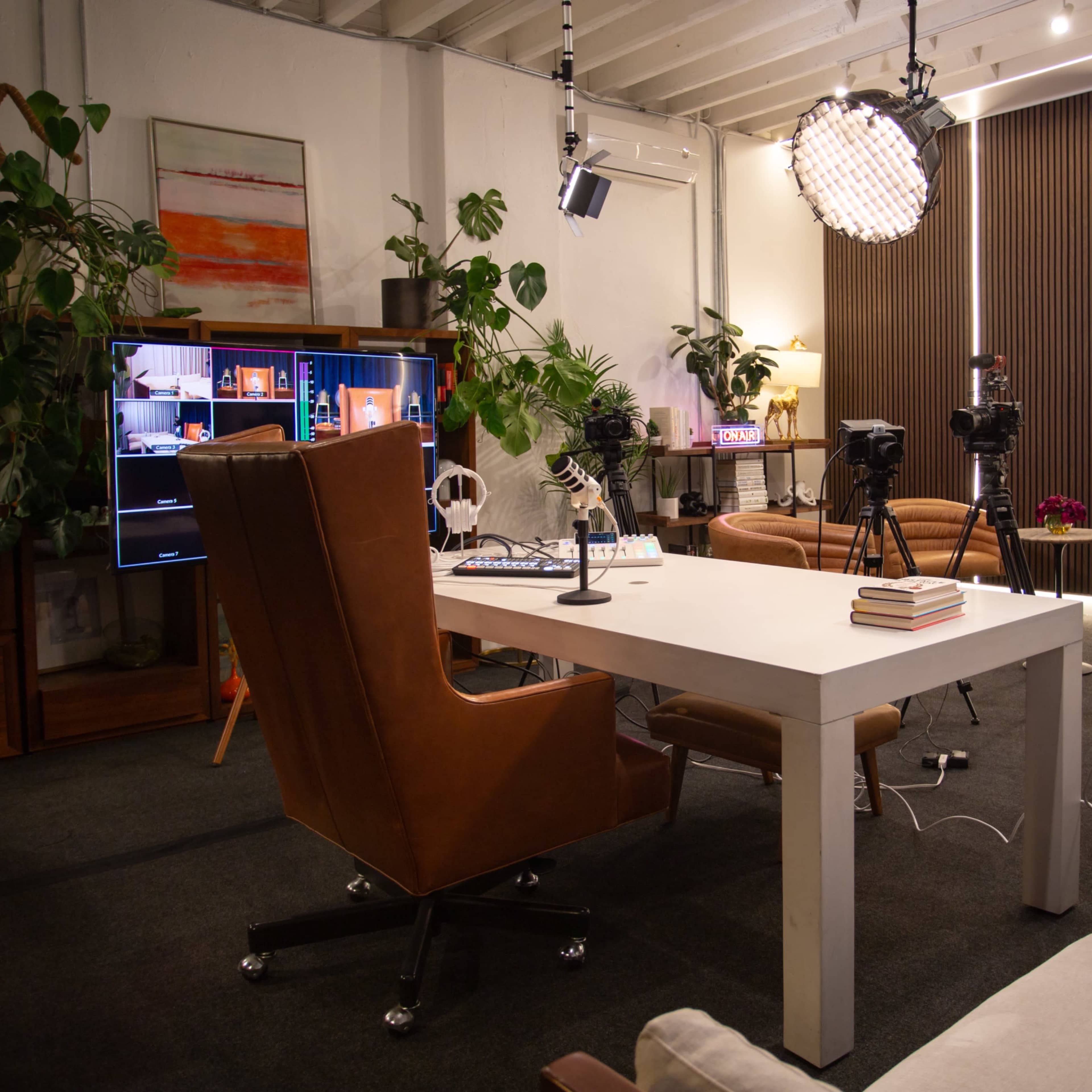 Podcast Studio with 4 Leather Chairs & White Executive Desk Image in Inglewood, Inglewood, CA