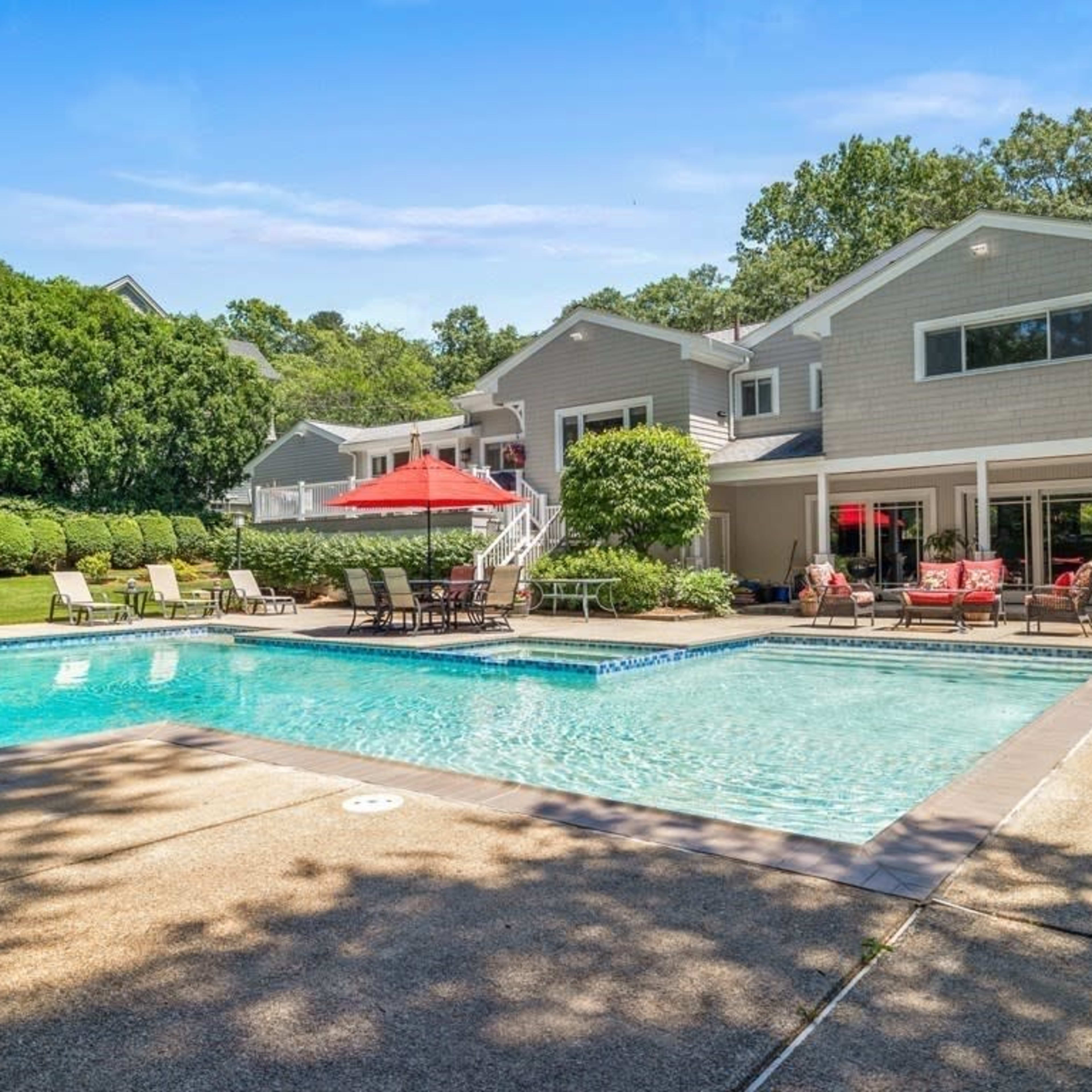 Beautiful backyard with huge swimming pool and hot tube Image in South Brookline, Brookline, MA