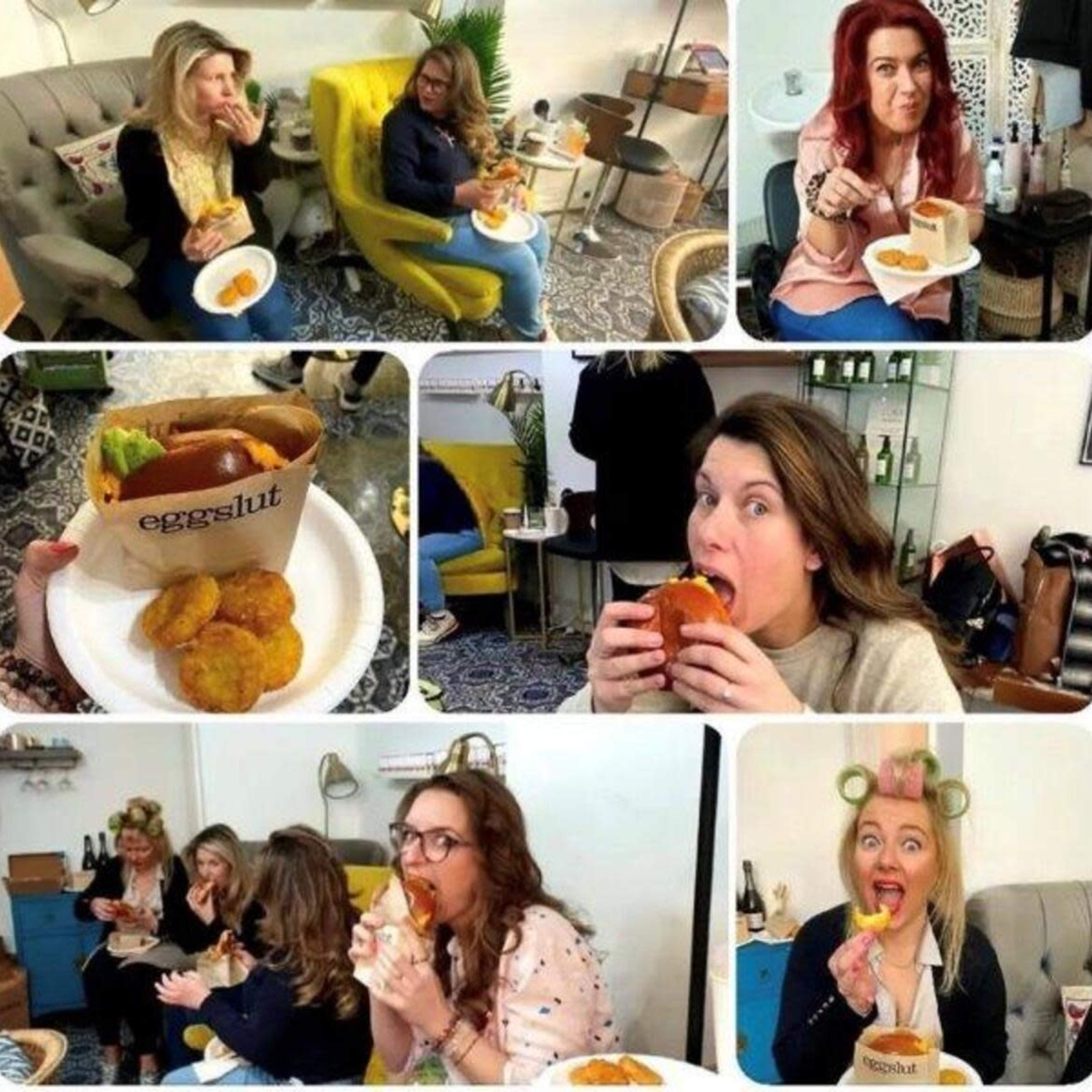 A group of women enjoying various food items in a casual dining setting.