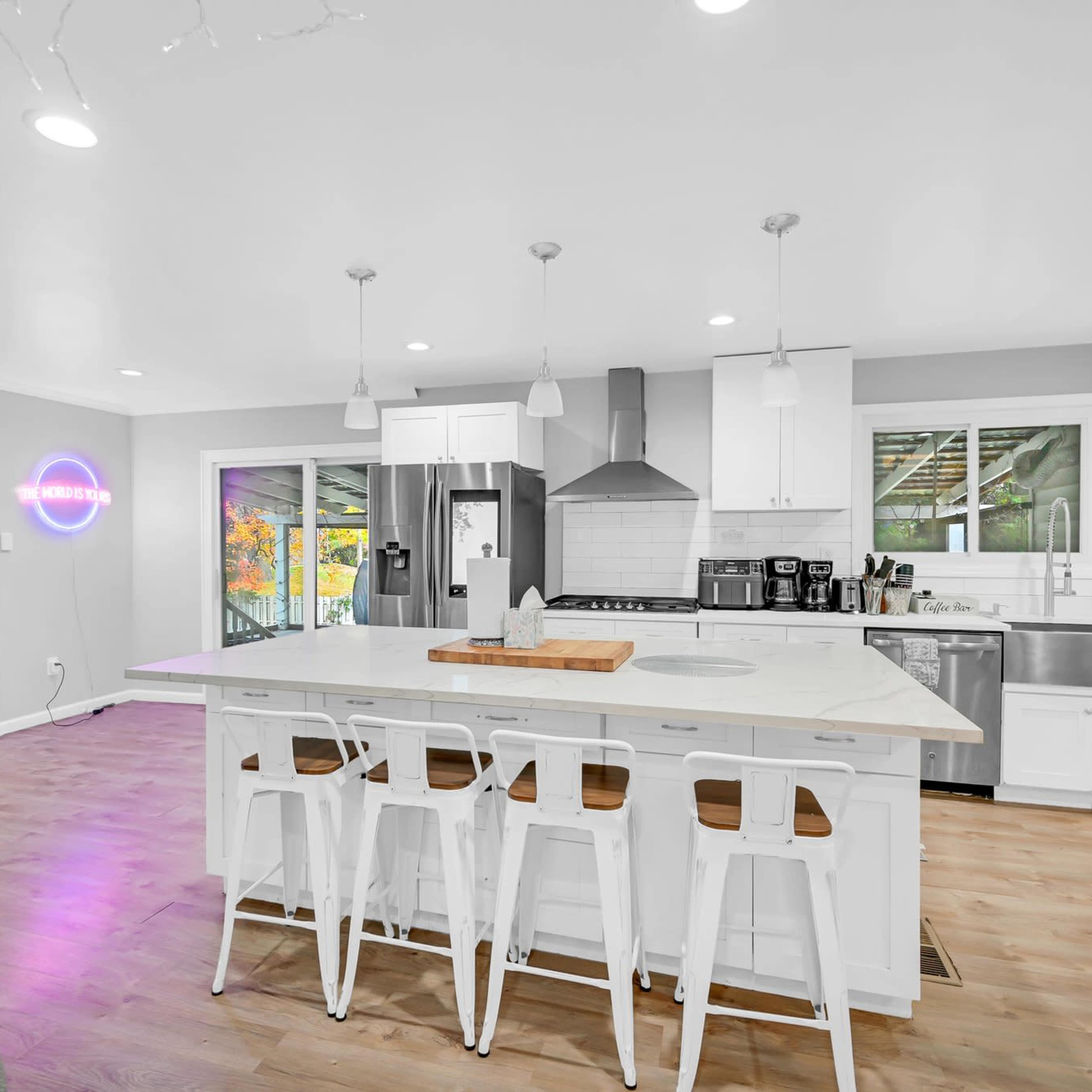 Modern Open Concept Entire single family home with basketball court, trampoline and full deck in the back yard. Small creek runs as well on side of property. Image in Englewood, Englewood, NJ