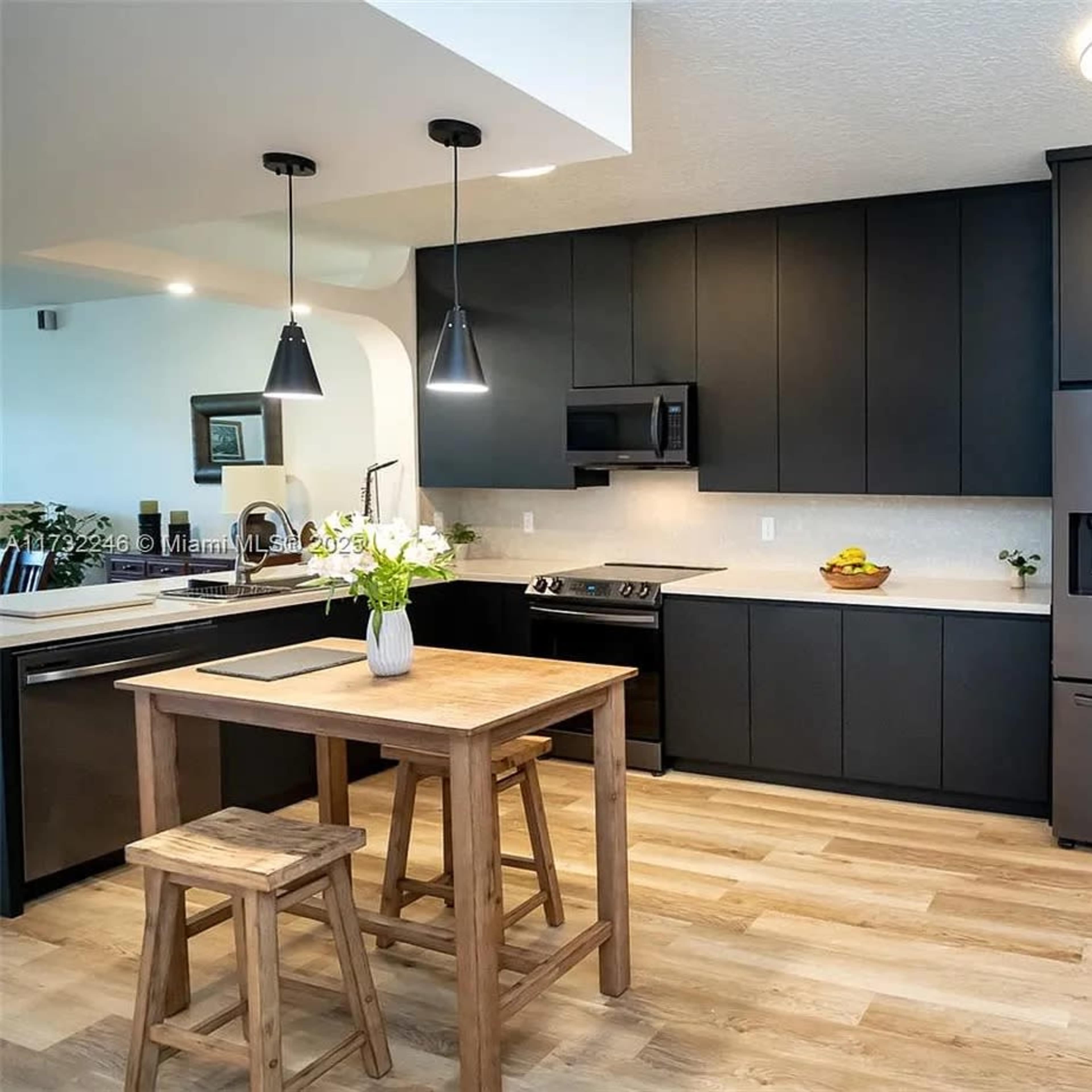 Artful Apartment with Sleek Minimalist Kitchen Image in Doral, Doral, FL