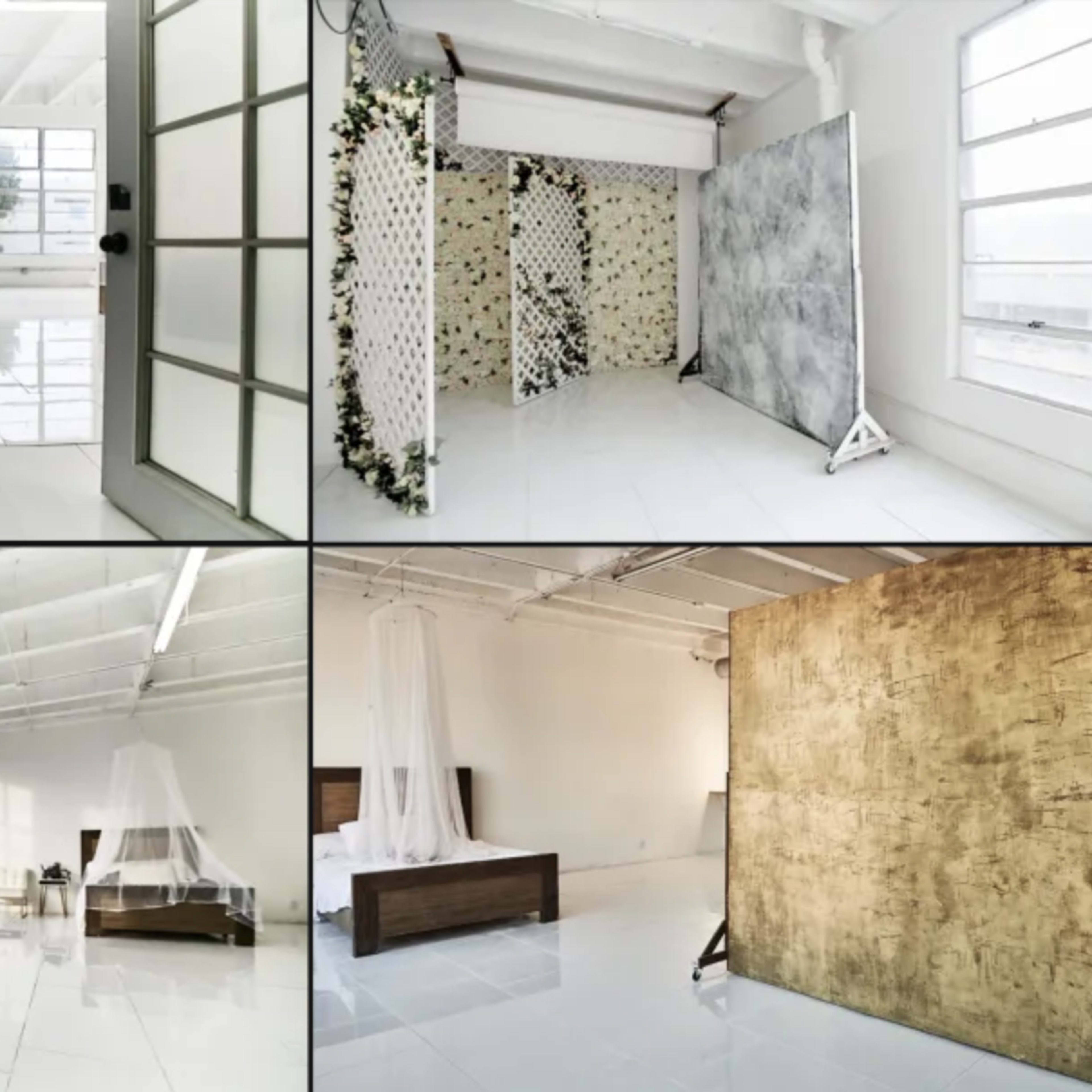 A bright, spacious interior with large windows and white walls, featuring different areas designed for photography, including backgrounds and furniture arrangements.