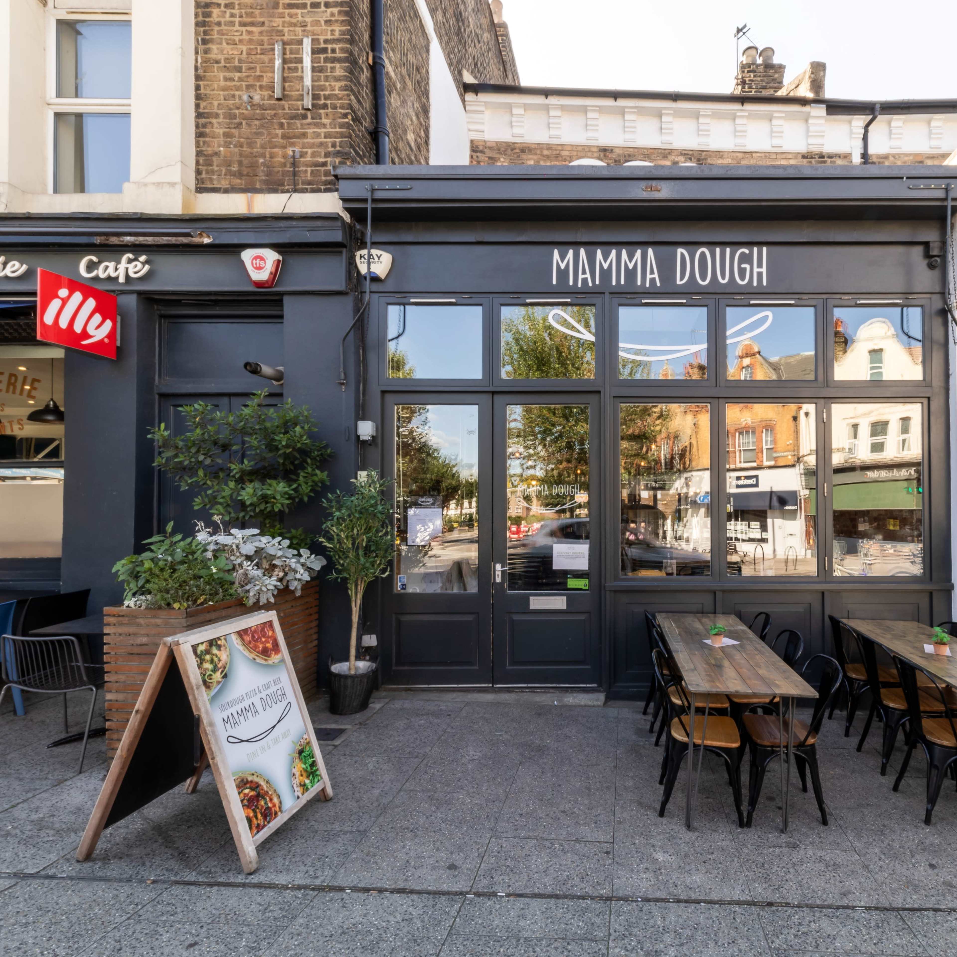 Gorgeous, rustic pizza restaurant with bifolding french doors and a function room. Image in Lewisham, London, England