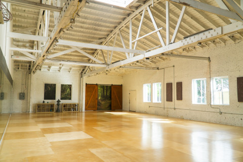 Warehouse Dance Studio with Brick Walls, Wood Floors and Front Stage ...