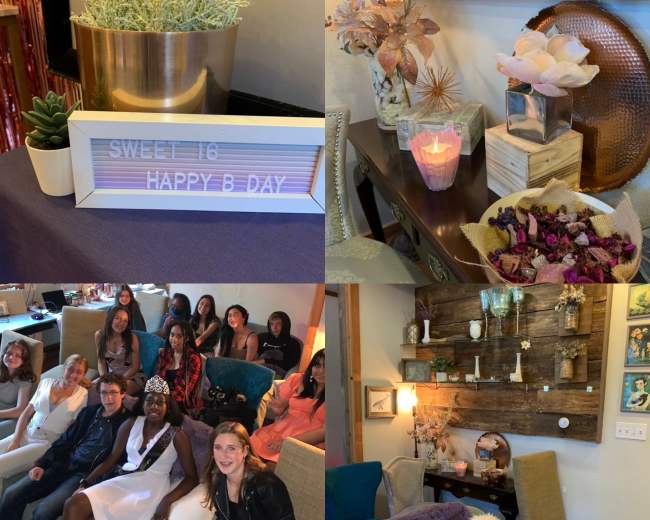A room decorated for a Sweet 16 birthday party, featuring a variety of floral arrangements, a sign displaying "Happy B Day," and a group of attendees sitting together on a couch.
