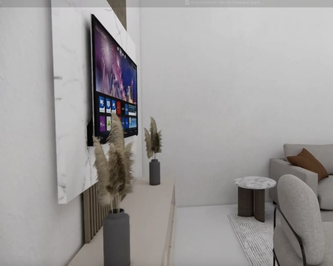 A modern living room features a light-colored sofa, a small round coffee table, and a wall-mounted television above a low cabinet with decorative plants.