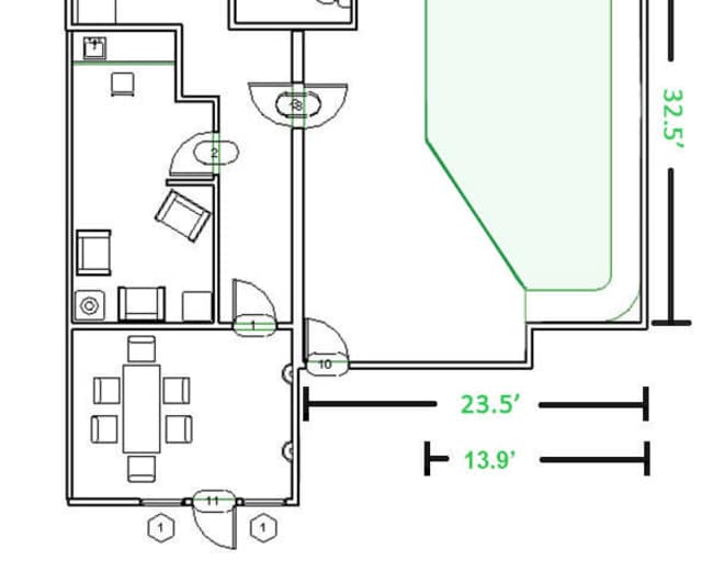 The image shows a floor plan of a building with labeled rooms and dimensions indicating the layout and sizes of various spaces.