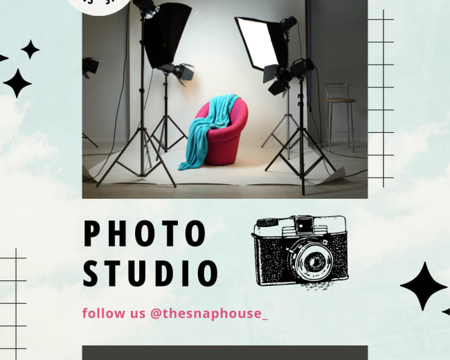 A photo studio setup with a pink chair, a turquoise blanket draped over it, and multiple lighting equipment positioned around the chair.