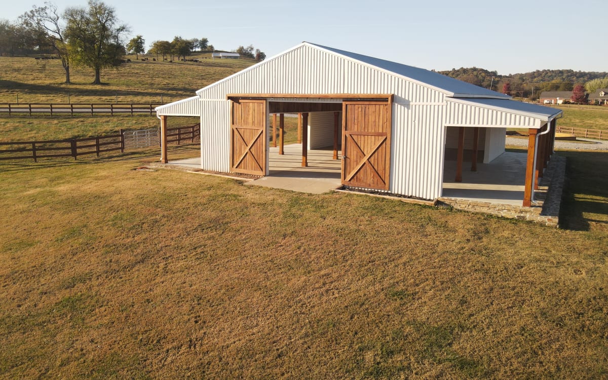 Charming Southern Bison Ranch with Whitewashed Barn and Modern Ranch