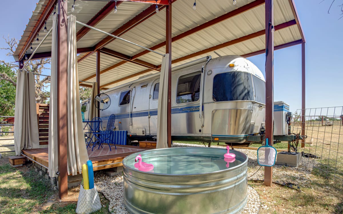 Vintage 33 ft Airstream on farm with goats, chickens and turkeys