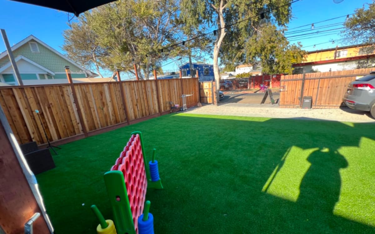 Roomy Outdoor space with synthetic grass, Oakland, CA Production