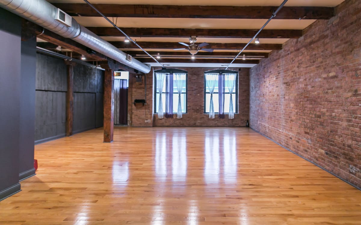 Loft Urban Yoga Studio in River North w/ Exposed Brick & Rustic