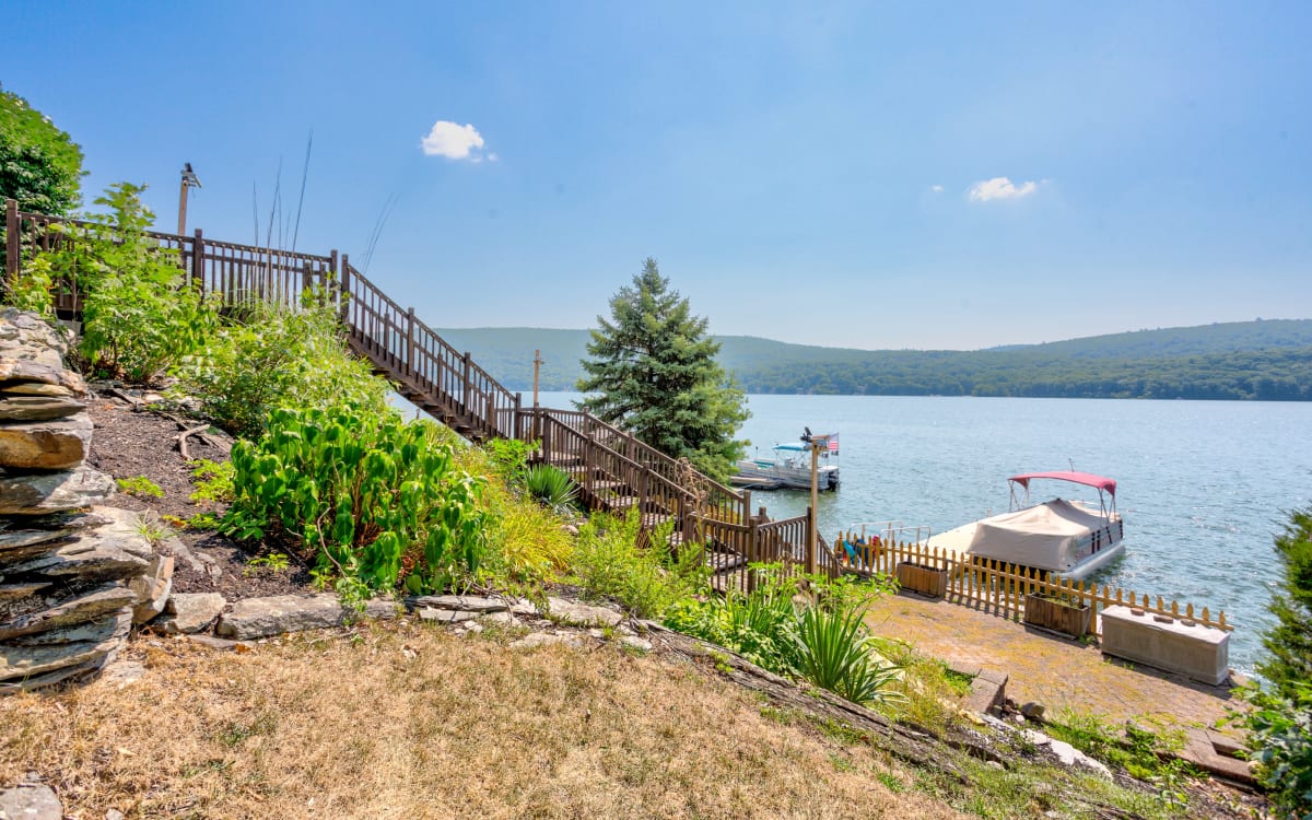 Stunning Lakefront 3BD home w private dock & patio, Greenwood lake, NY Production Peerspace