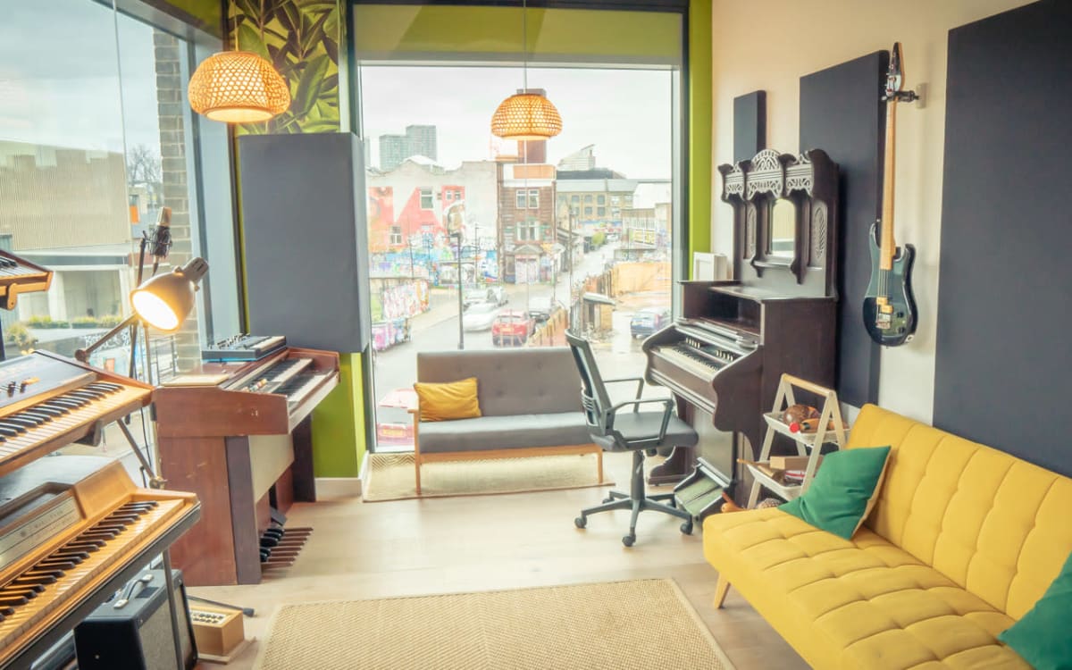 Recording studio with natural light and views of local urban area ...