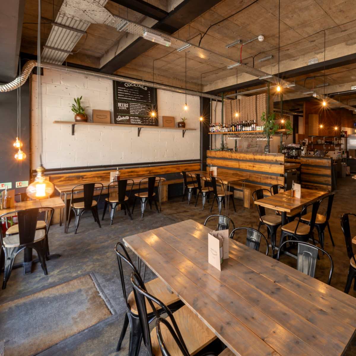 Rustic pizza restaurant with high exposed beam ceilings. in London Image in London, London, ENG