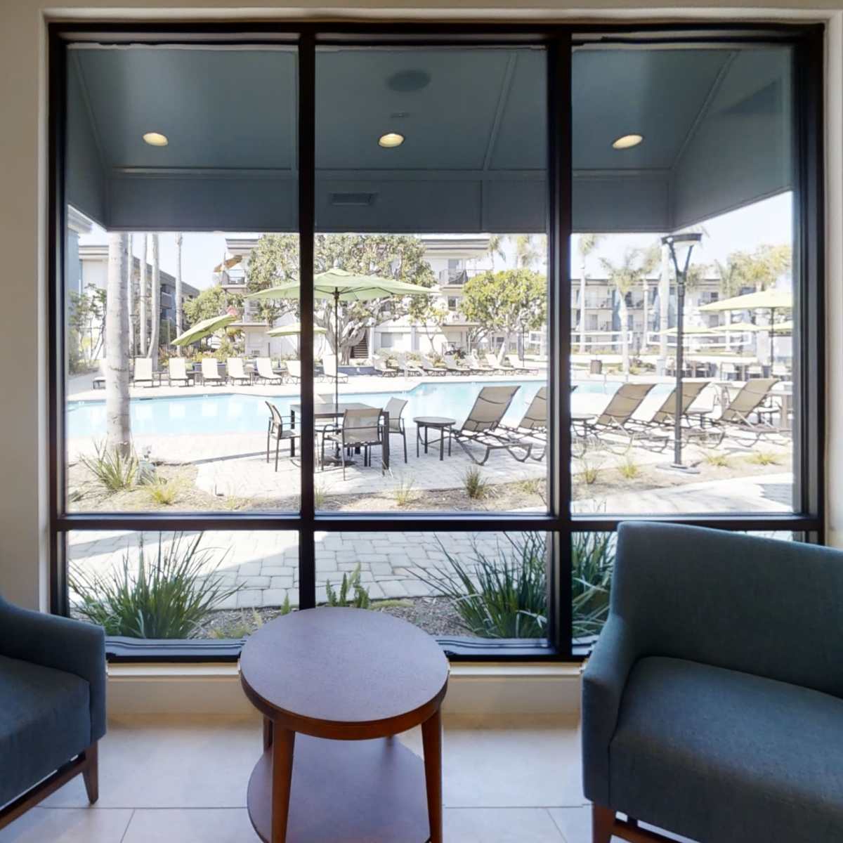 Bright Wi-Fi Lounge w/ View, Table & Chair Seating and Cubicle Break ...