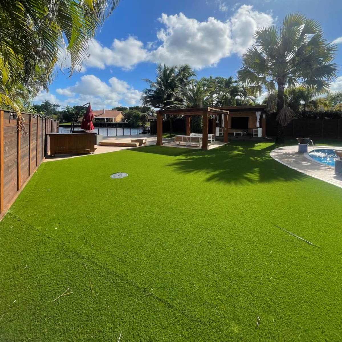 Large, Chic Backyard Space with Heated Pool, Cabanas, TV, Outdoor Kitchen and More in Plantation Image in Plantation, Plantation, FL