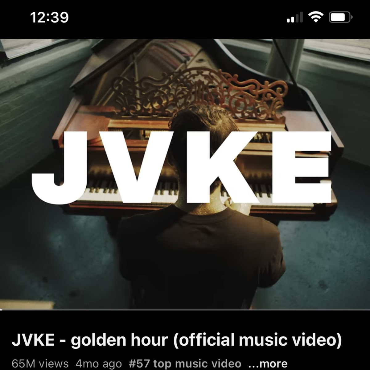 A music video titled "JVKE - golden hour" with a subscribe button and comments section visible beneath the video player.